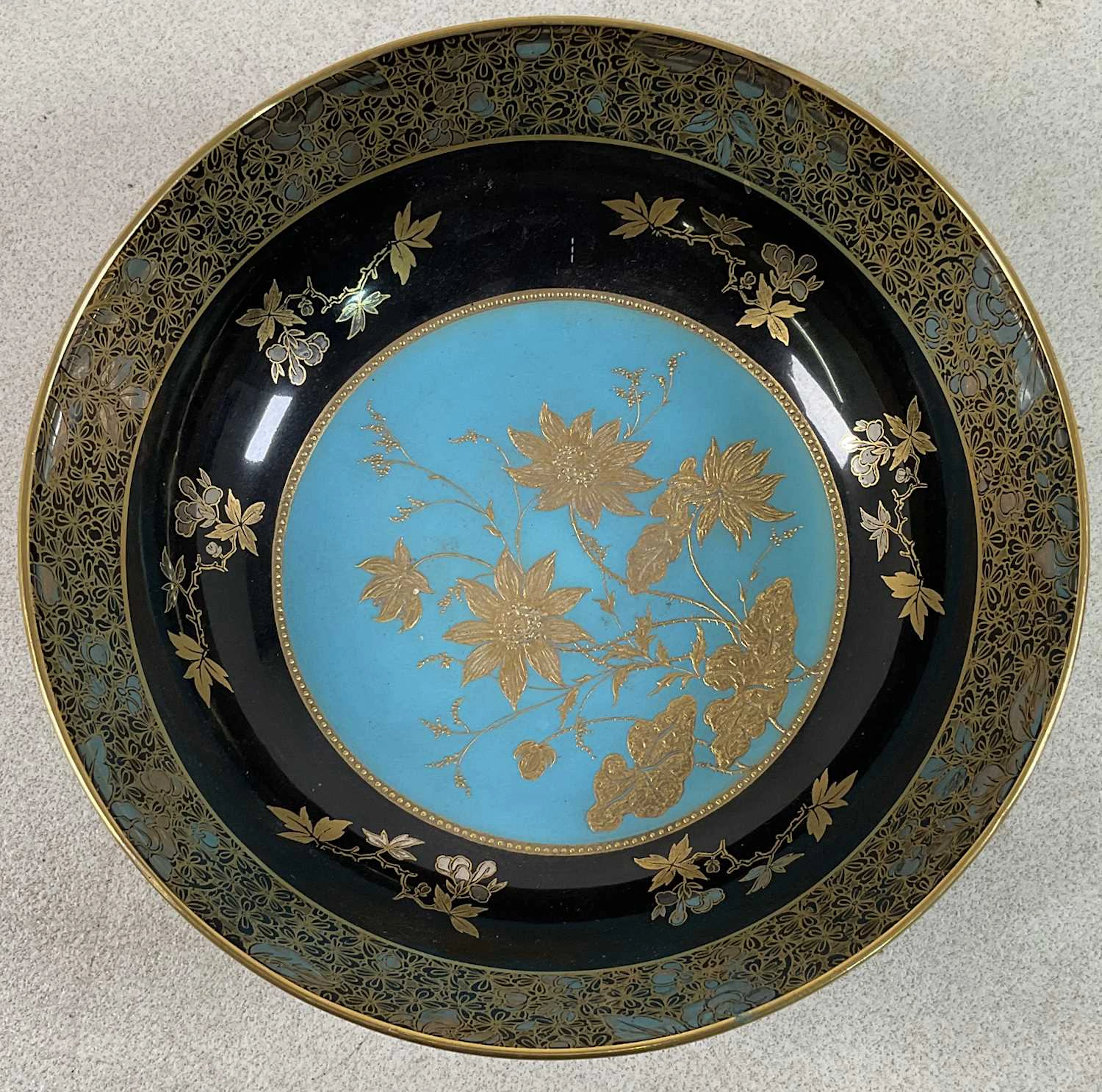 ROYAL DOULTON; an early 20th century shallow footed bowl...