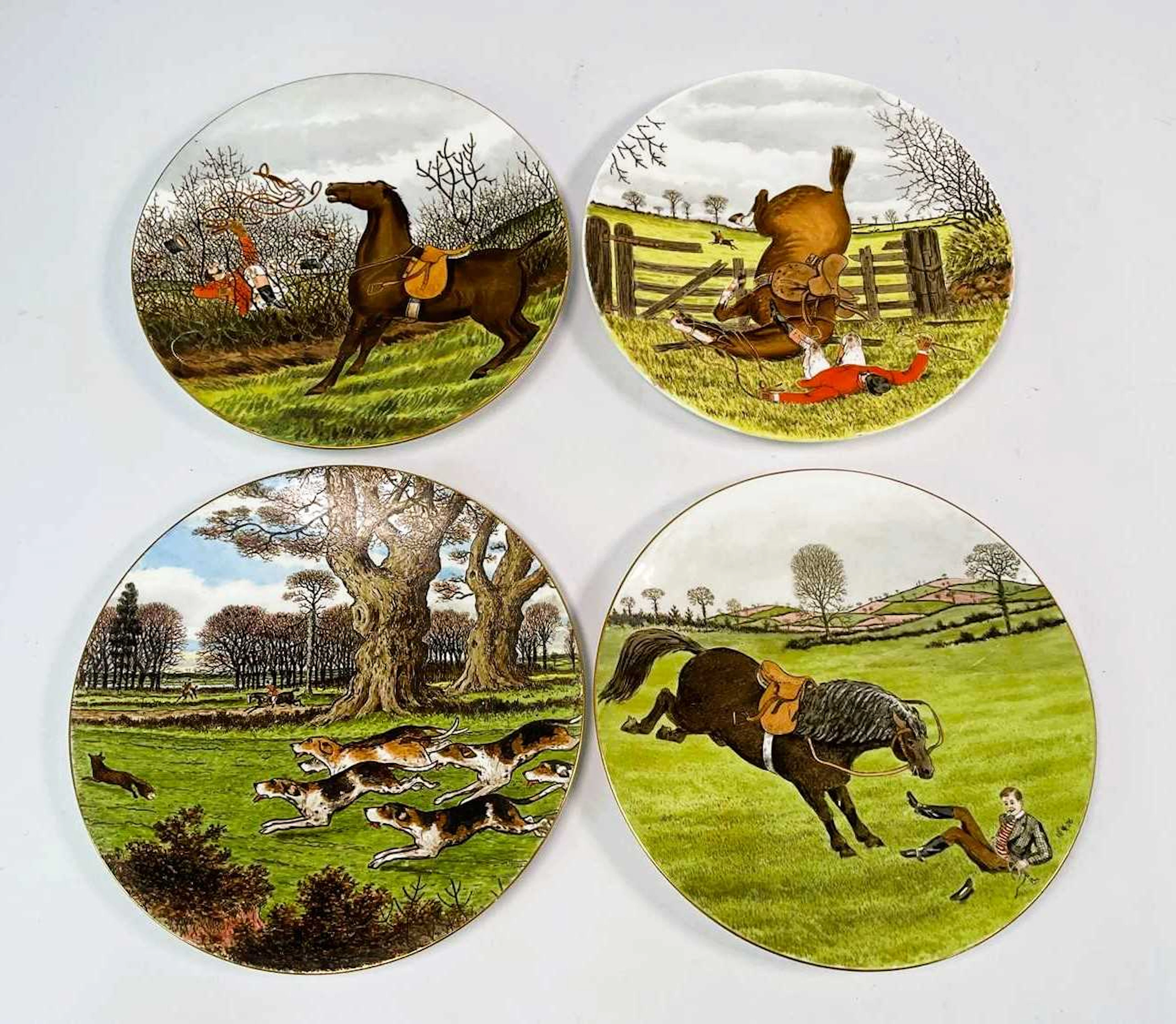 CAULDON; four hand painted porcelain plates depicting hunting scenes
