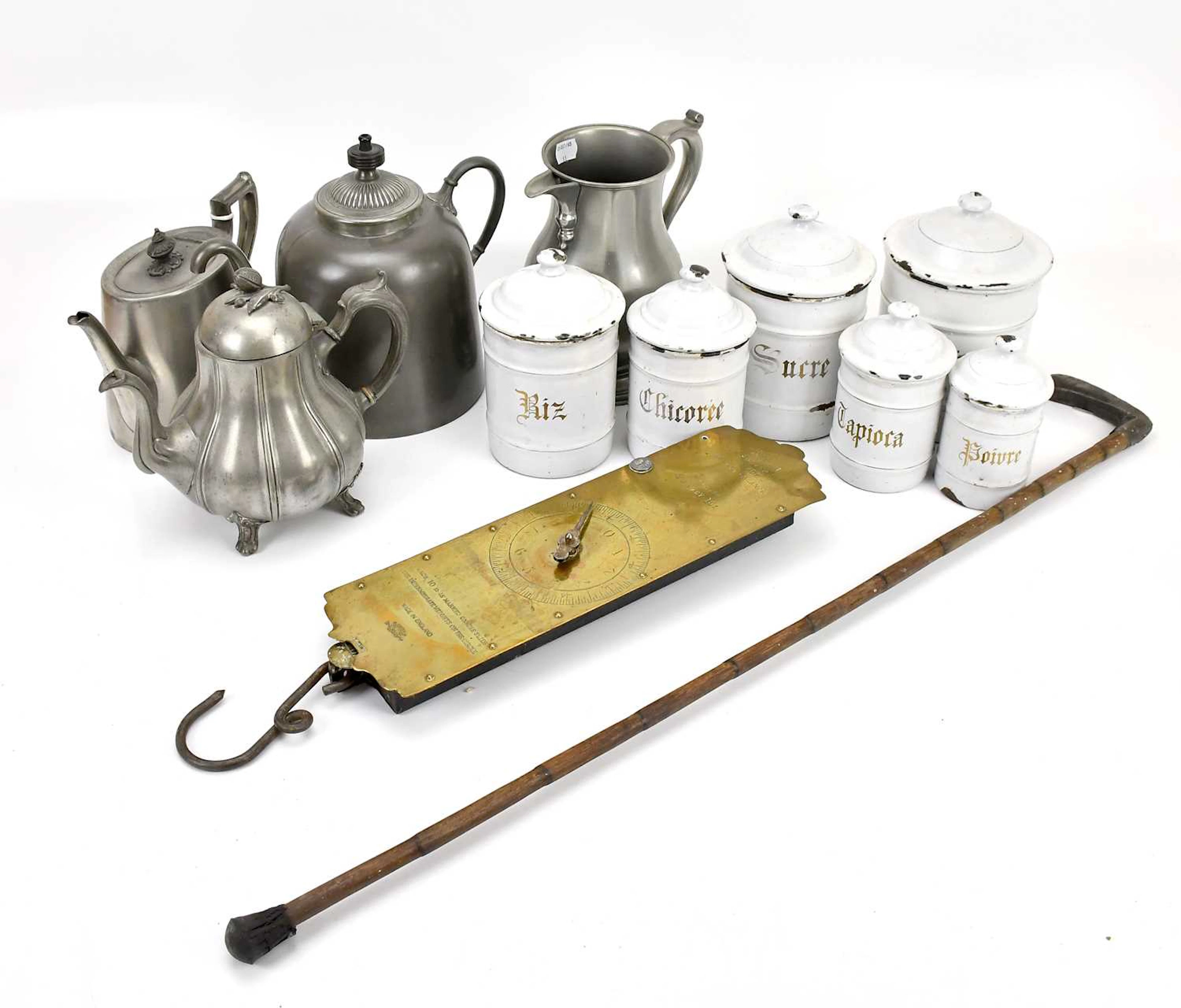 A collection of six French enamel storage jars and covers