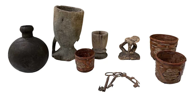 A group of African tribal carved wooden items
