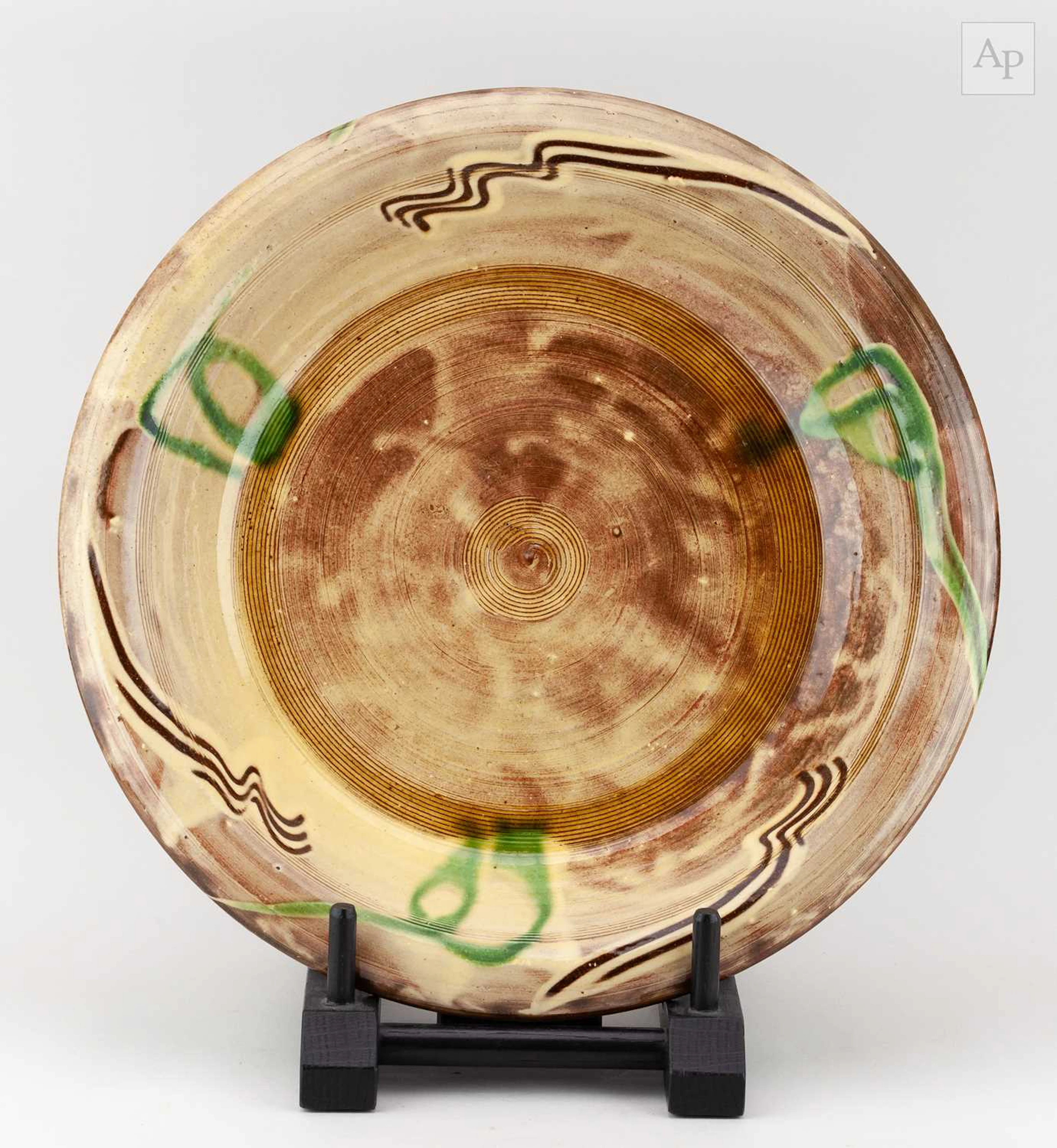 CLIVE BOWEN (born 1943); a slipware charger with trailed...