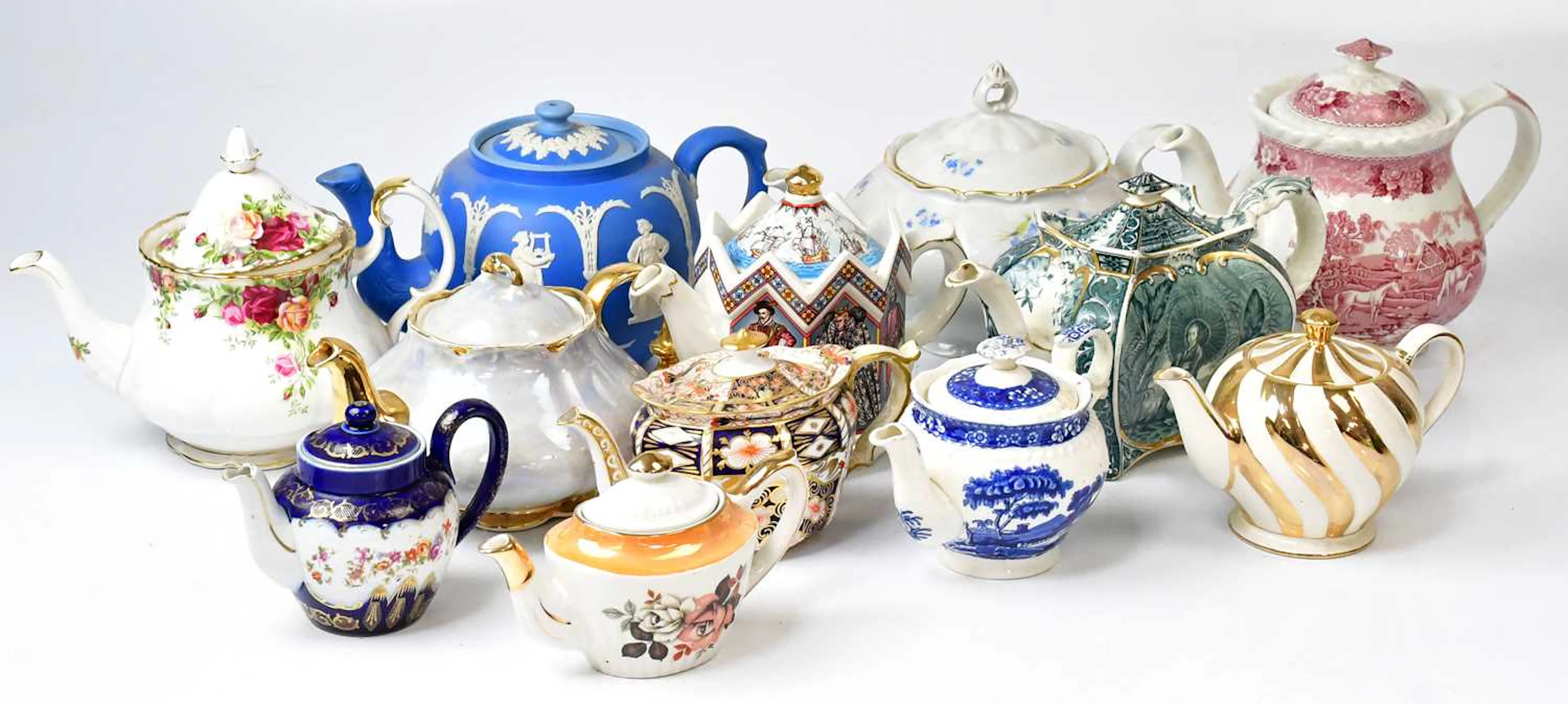 A quantity of various 19th and 20th century teapots