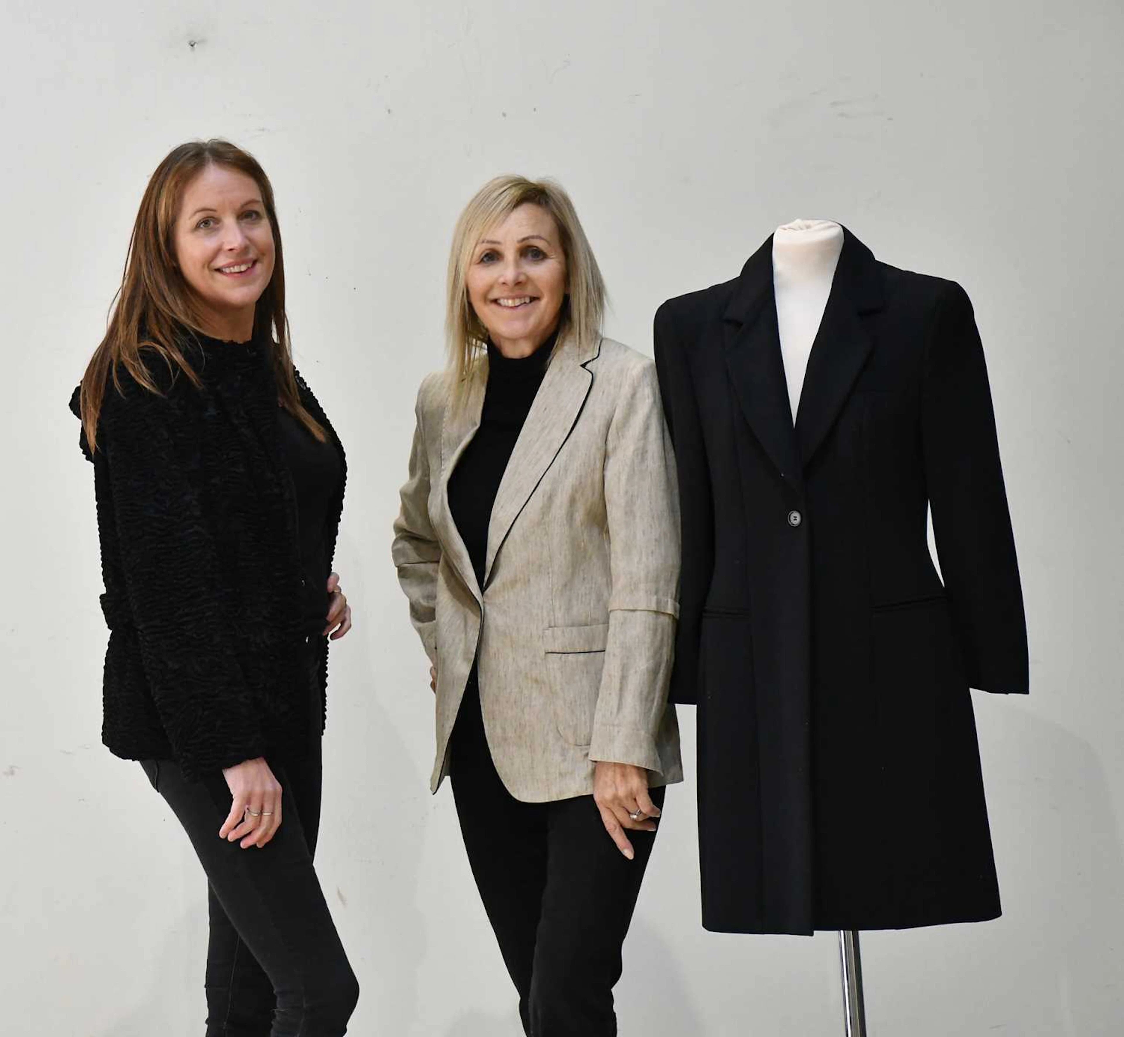 GIORGIO ARMANI; a knee-length 100% wool lined fitted coat