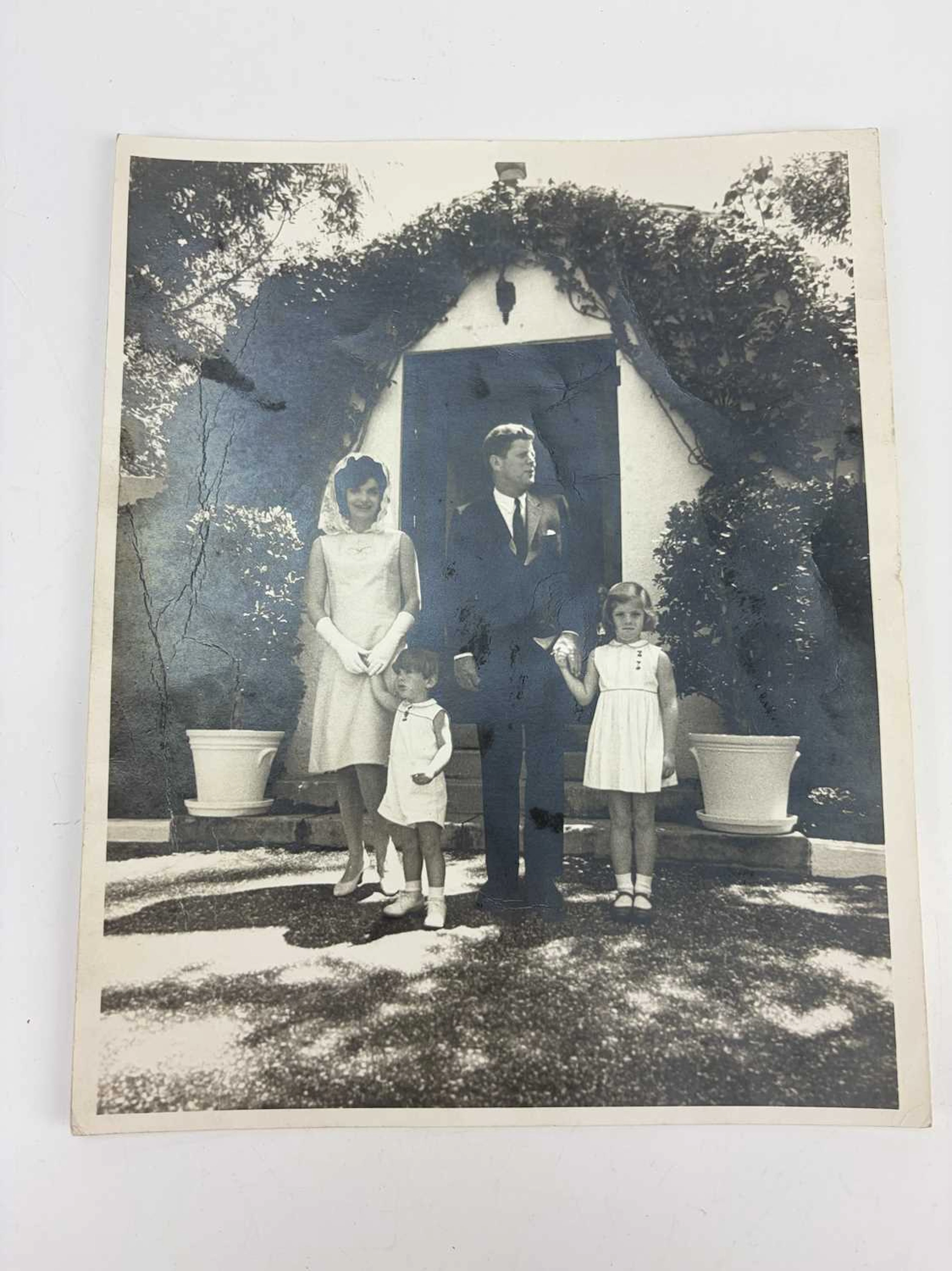 JAQUELINE KENNEDY; a black and white family portrait...