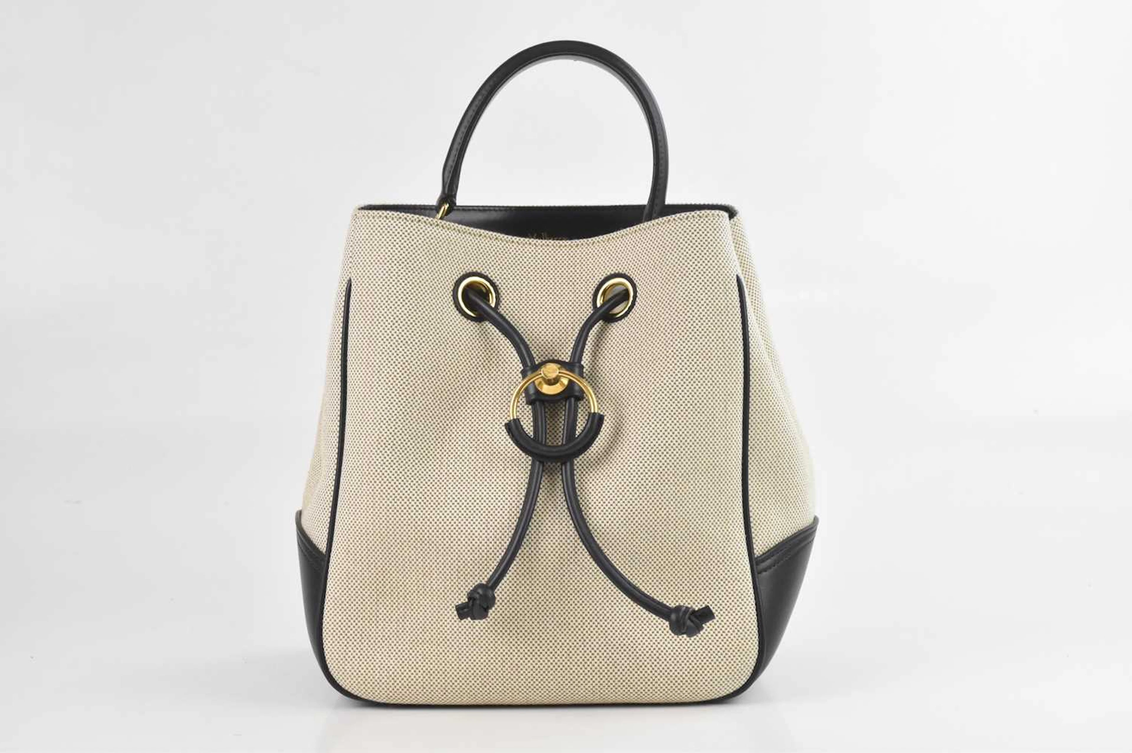 MULBERRY; a cream and black woven camera Hampstead bucket handbag