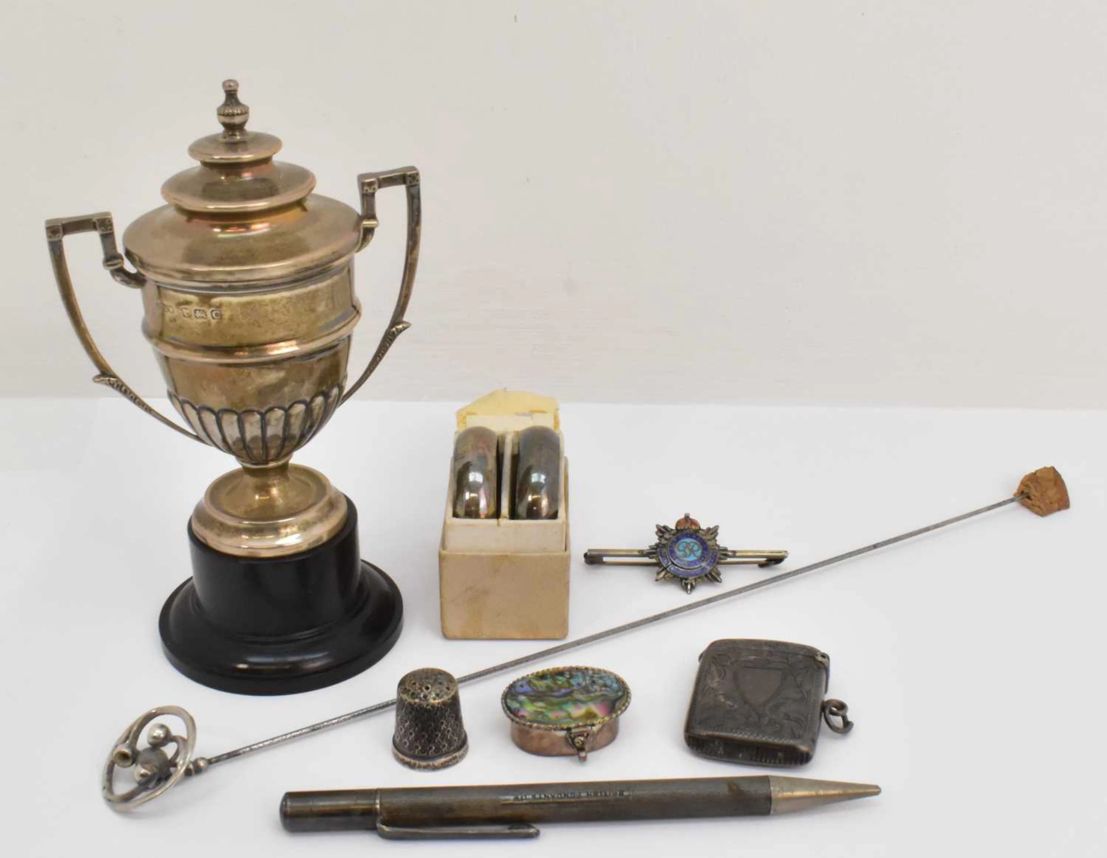 Various small hallmarked silver comprising a small trophy