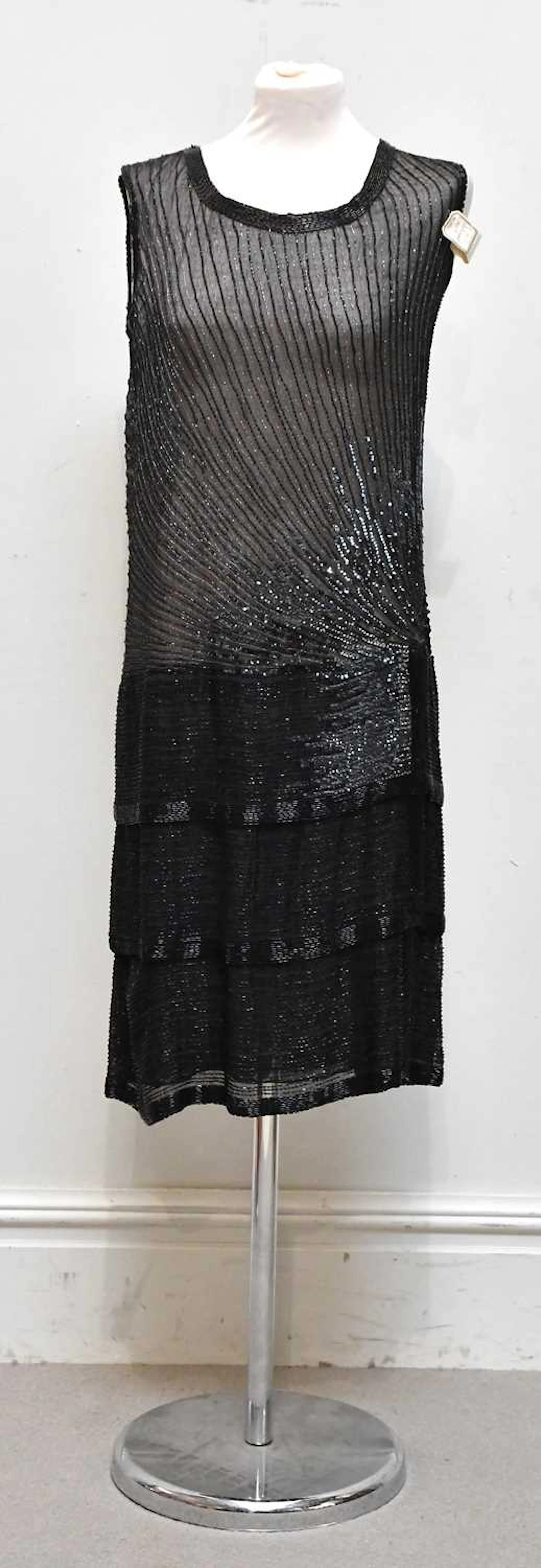 An original 1920s Art Deco black flapper style beaded dress