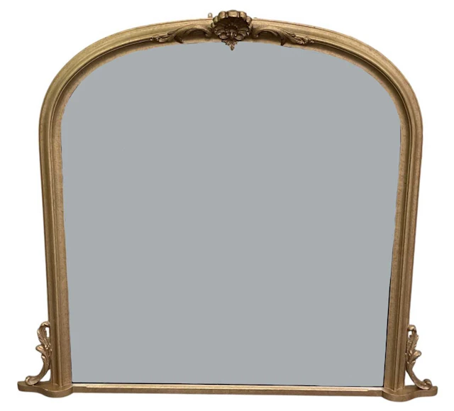 A reproduction gilt framed dome top overmantel wall mirror
