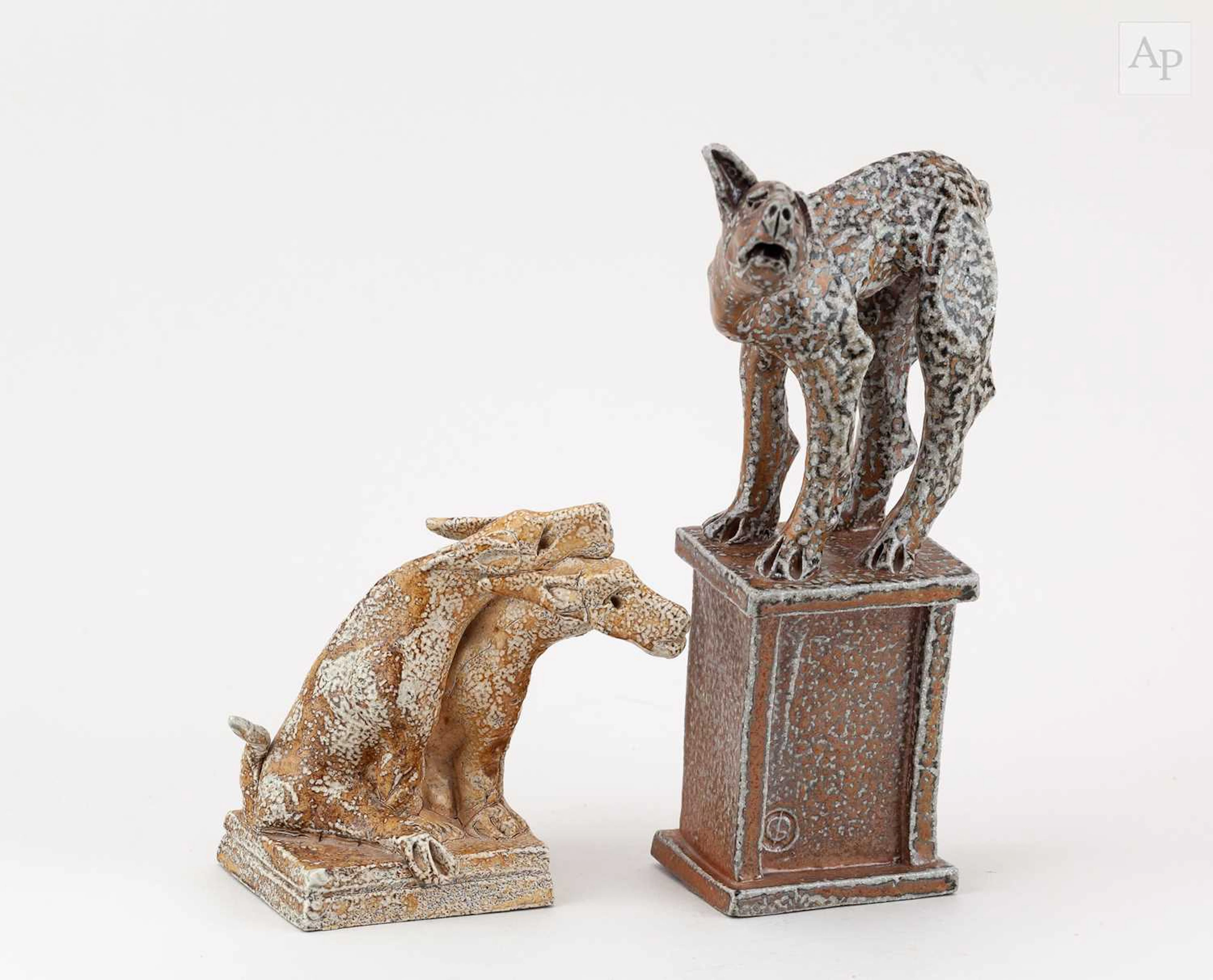 IAN GREGORY (1942-2021); a salt glazed sculpture of a dog on a plinth