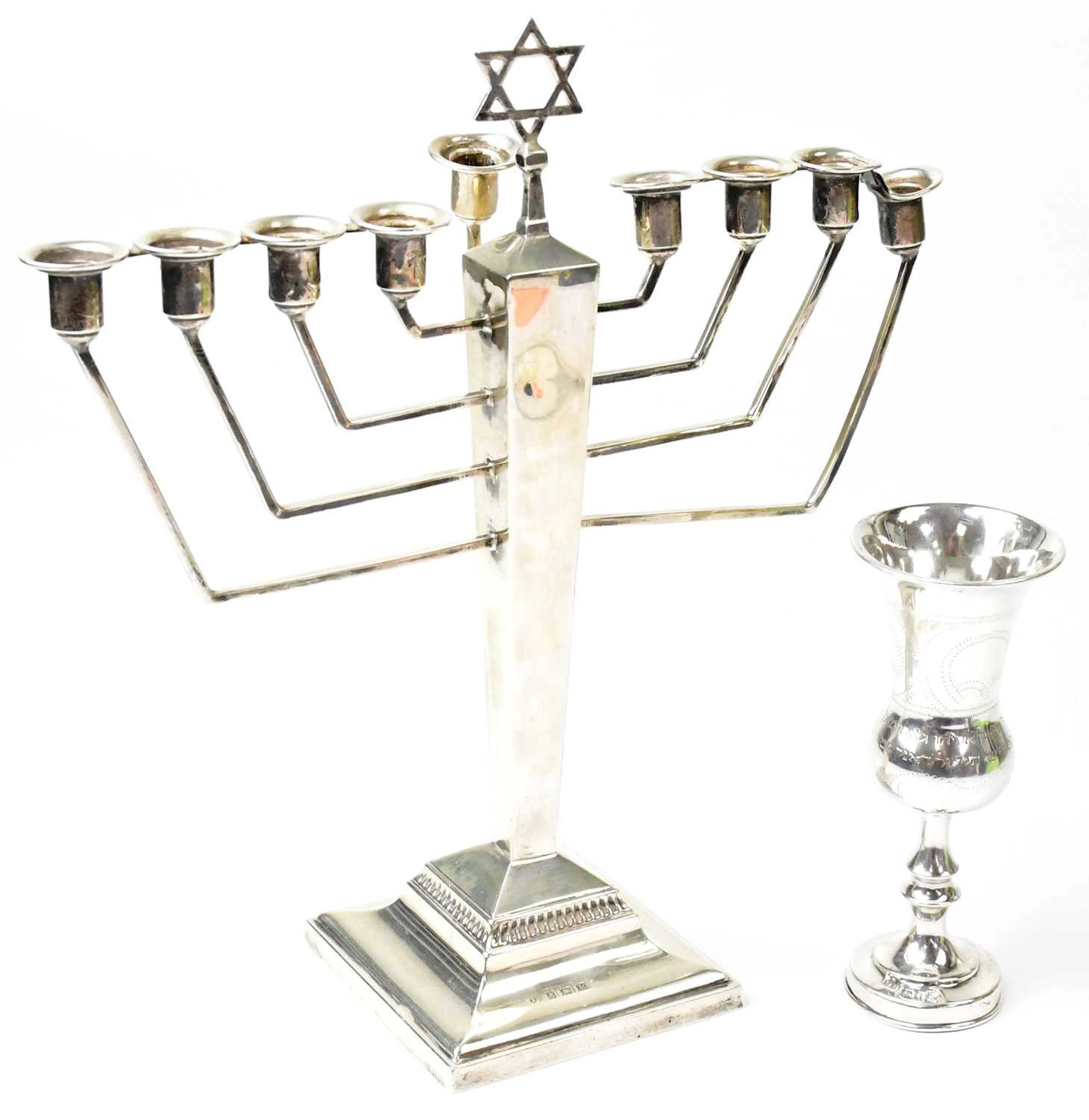 ALEXANDER SMITH; an Elizabeth II hallmarked silver Hannukah nine-branch menorah