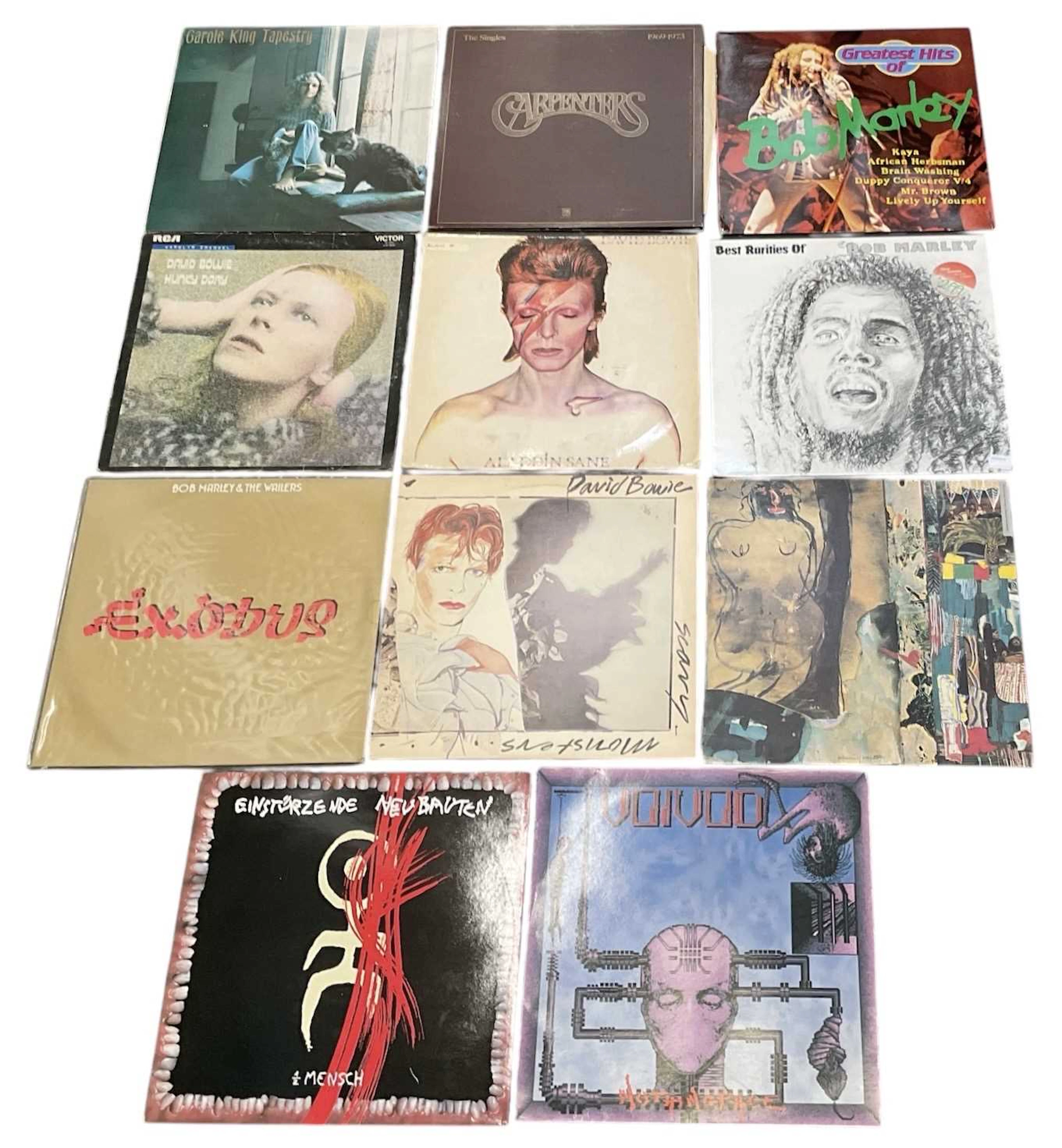 A collection of approximately eleven assorted records