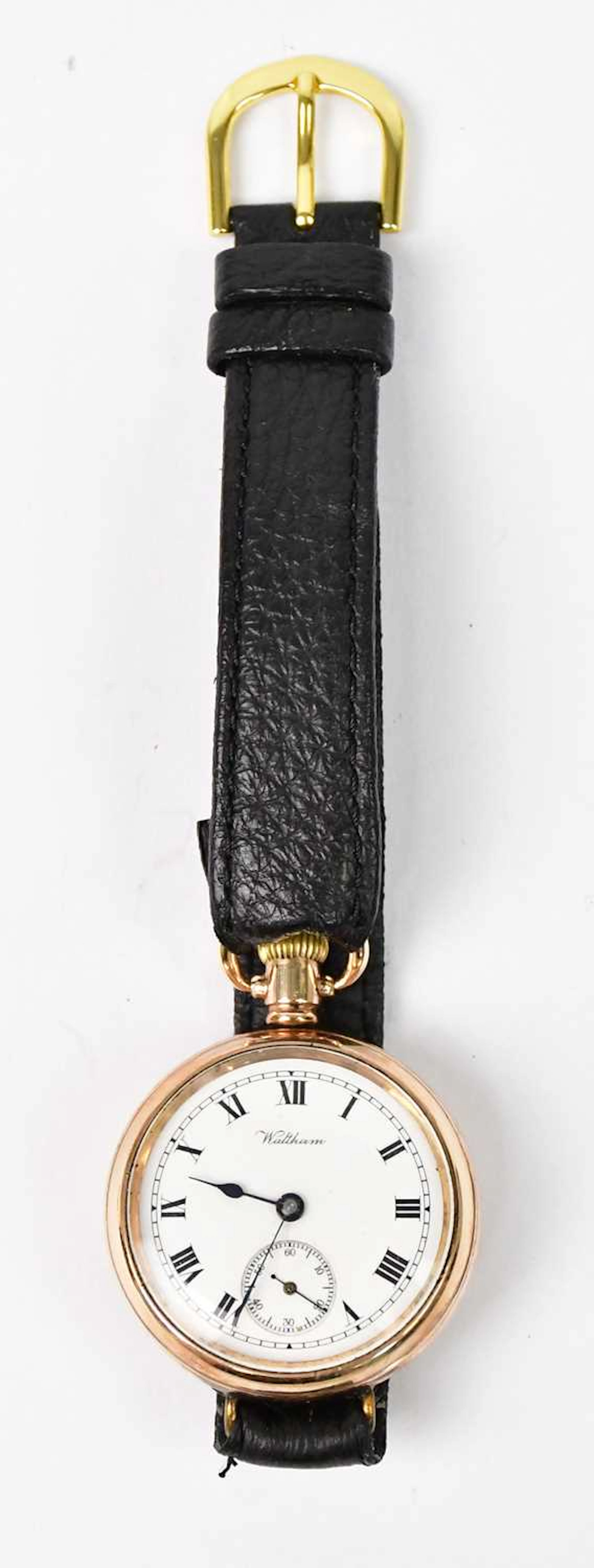 WALTHAM; a gold-plated fob watch converted to a wristwatch