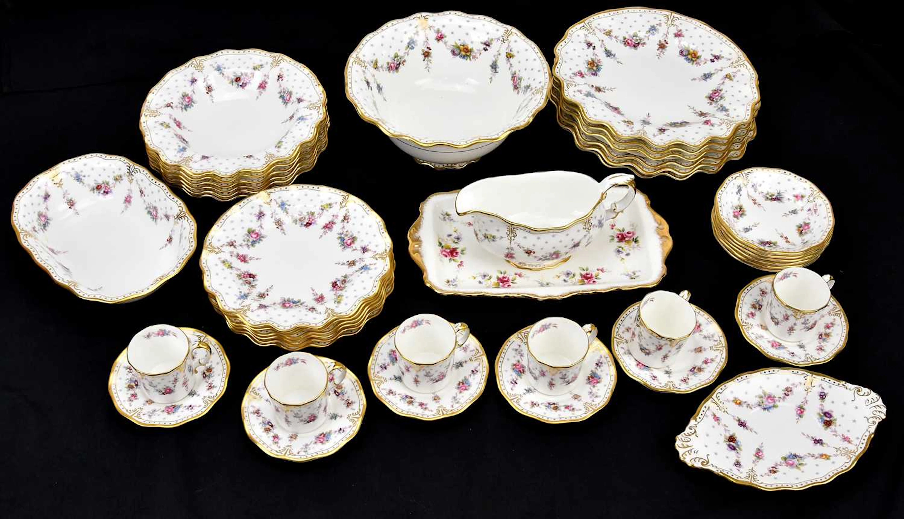 ROYAL CROWN DERBY; a 'Royal Antoinette' part dinner and coffee service