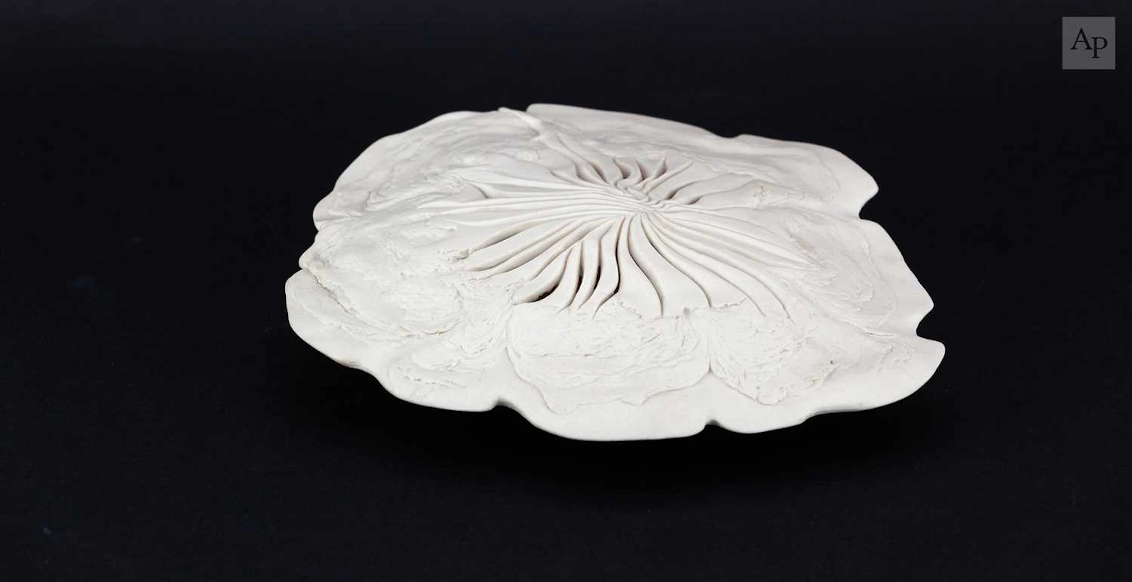 MAGGIE BARNES (born 1940); a carved porcelain crater bowl form