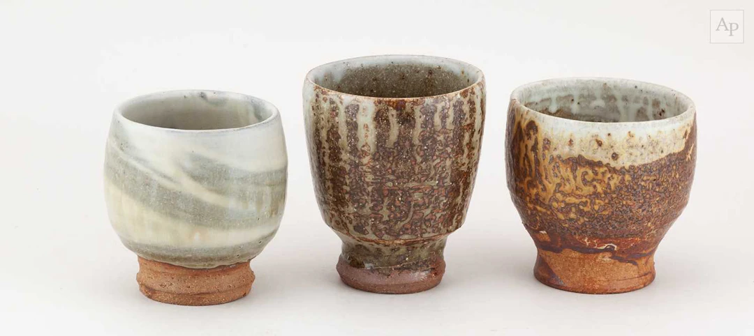TIM LAKE (born 1974); a trio of stoneware cups covered in different ash glazes