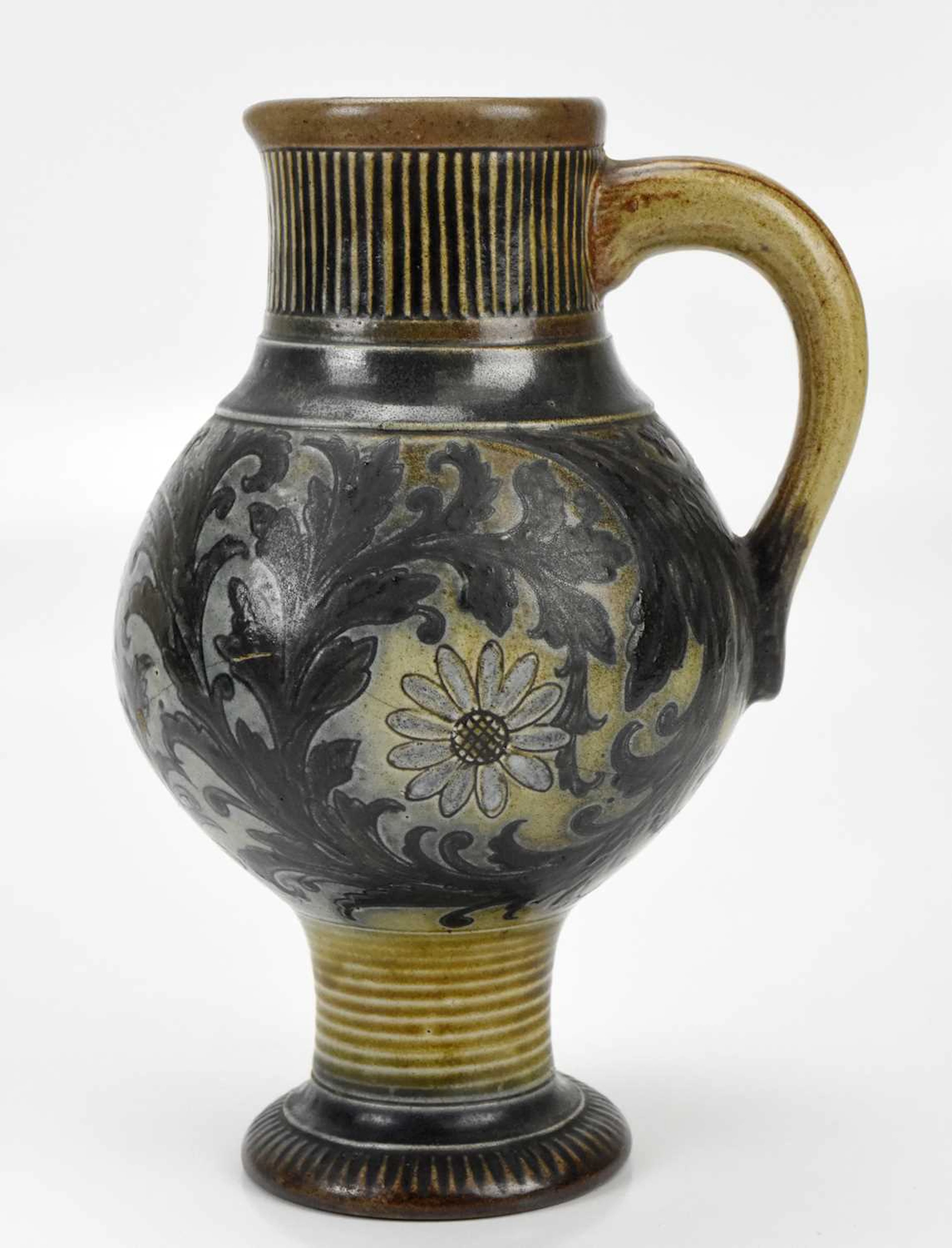 ROBERT WALLACE MARTIN; a Martin Brothers jug of bulbous form