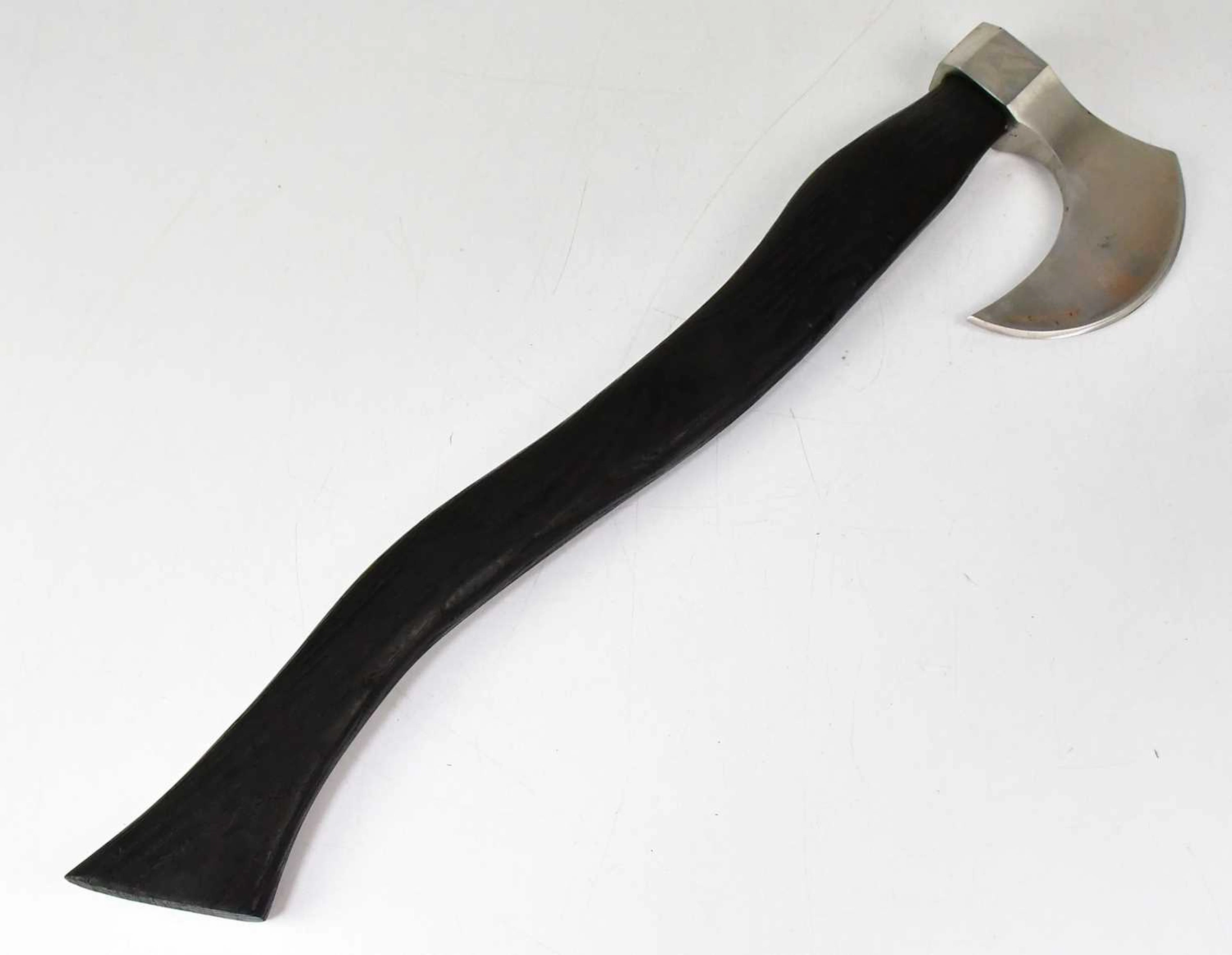 A re-enactment battle axe with leather sheath and black ash handle