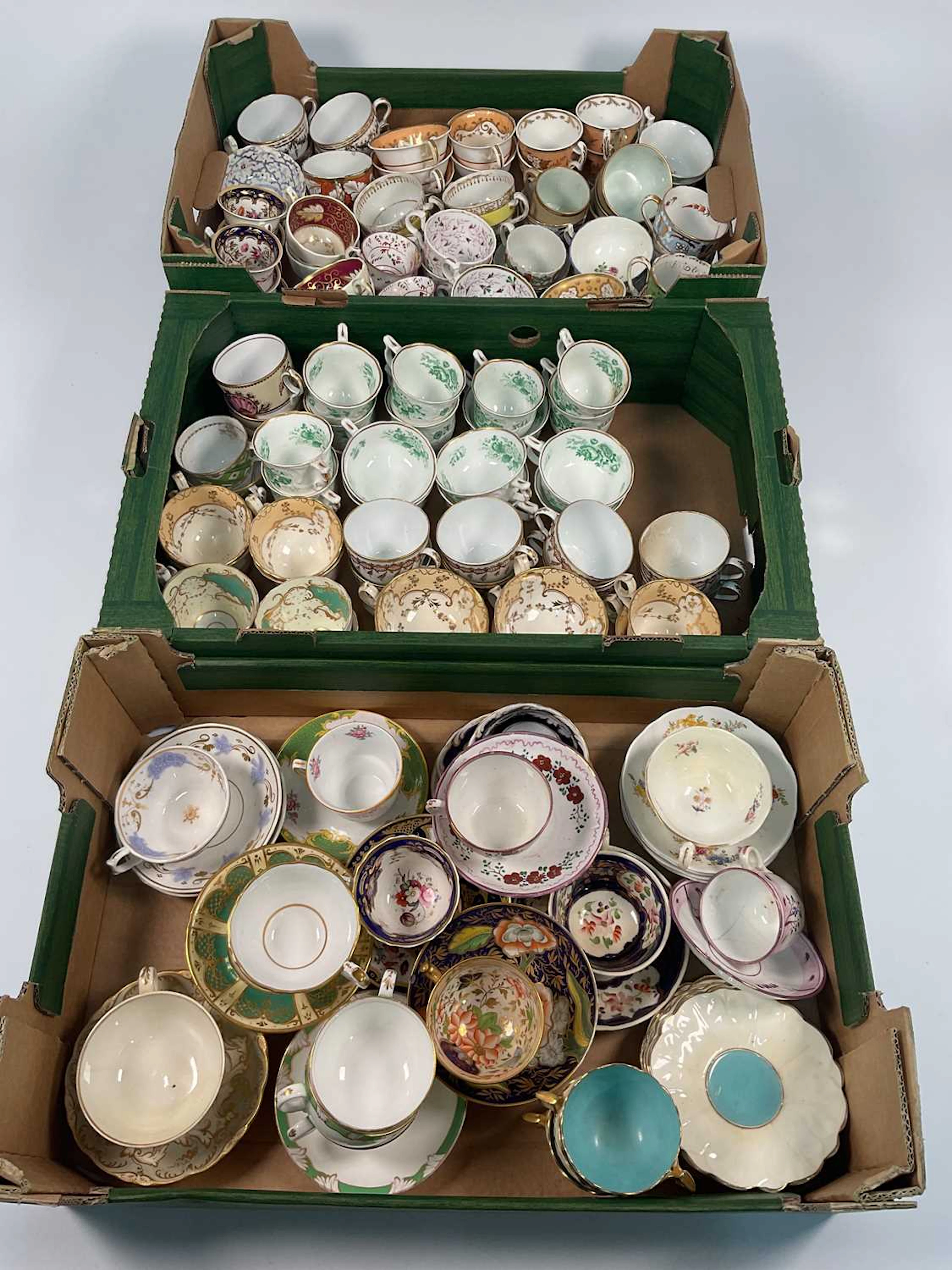 A quantity of 19th and 20th century porcelain teacups and saucers