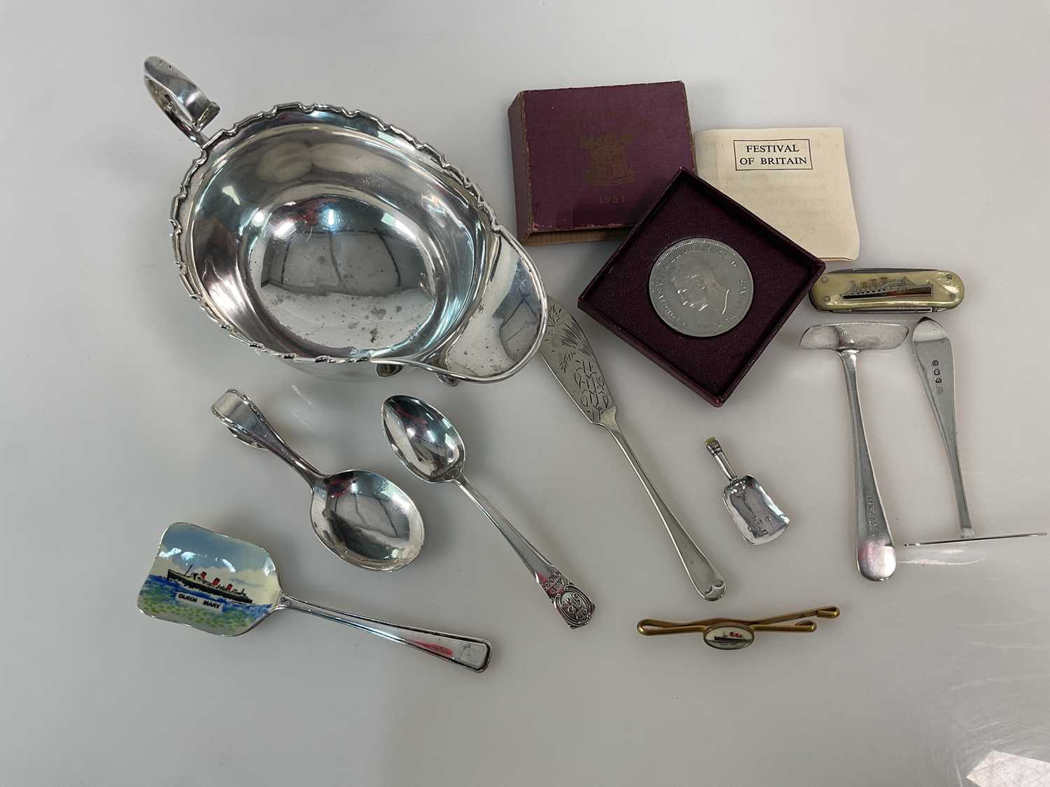MAPPIN & WEBB LTD; a George V hallmarked silver sauce boat