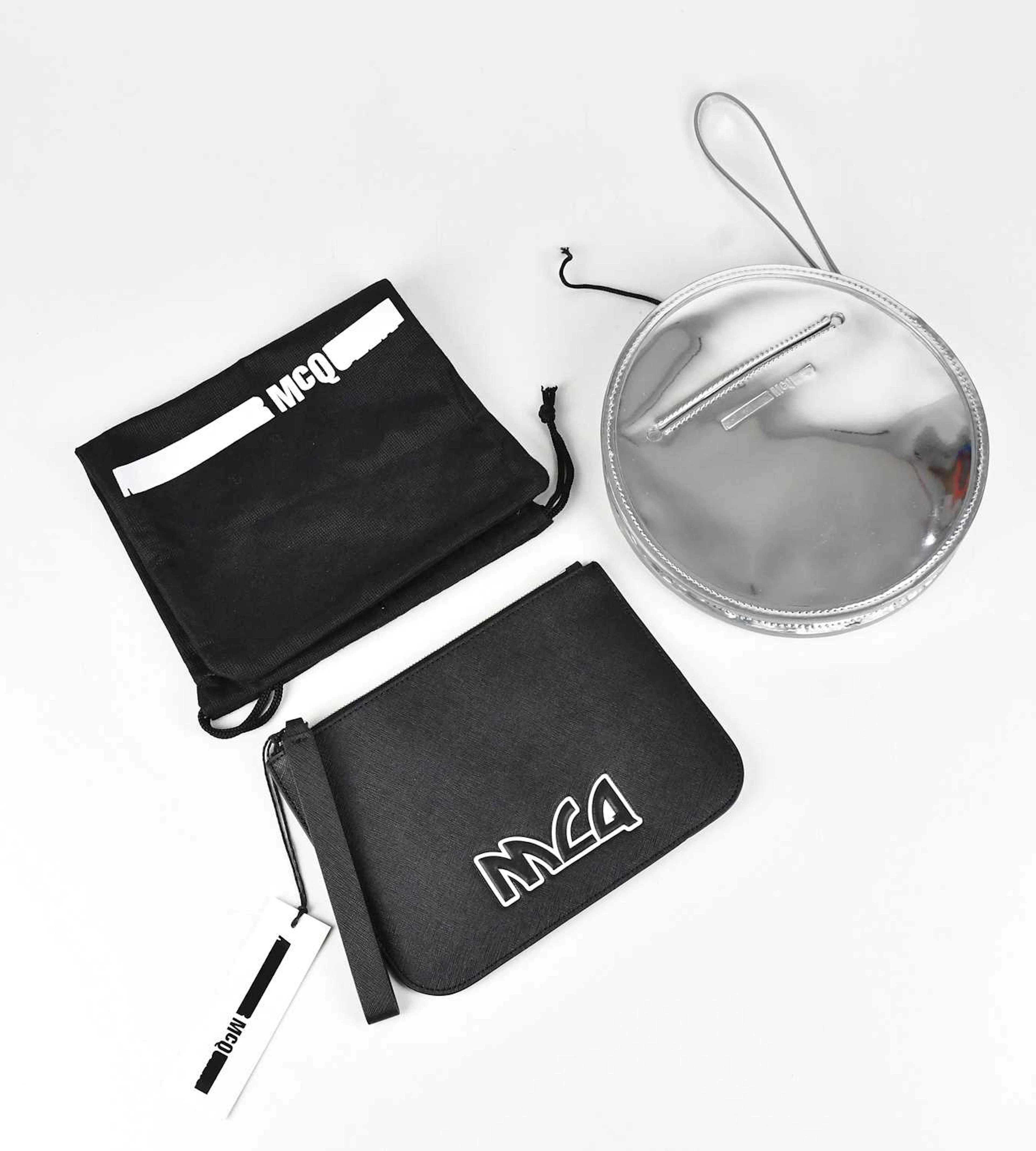 ALEXANDER MCQUEEN; a black Saffiano leather pouch with large logo to front