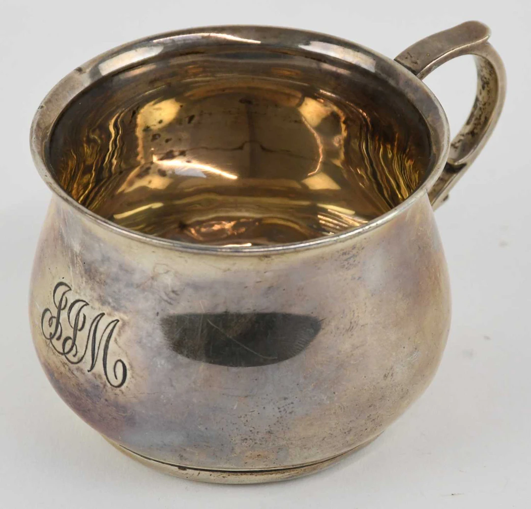 A George V hallmarked silver teacup/toddy cup