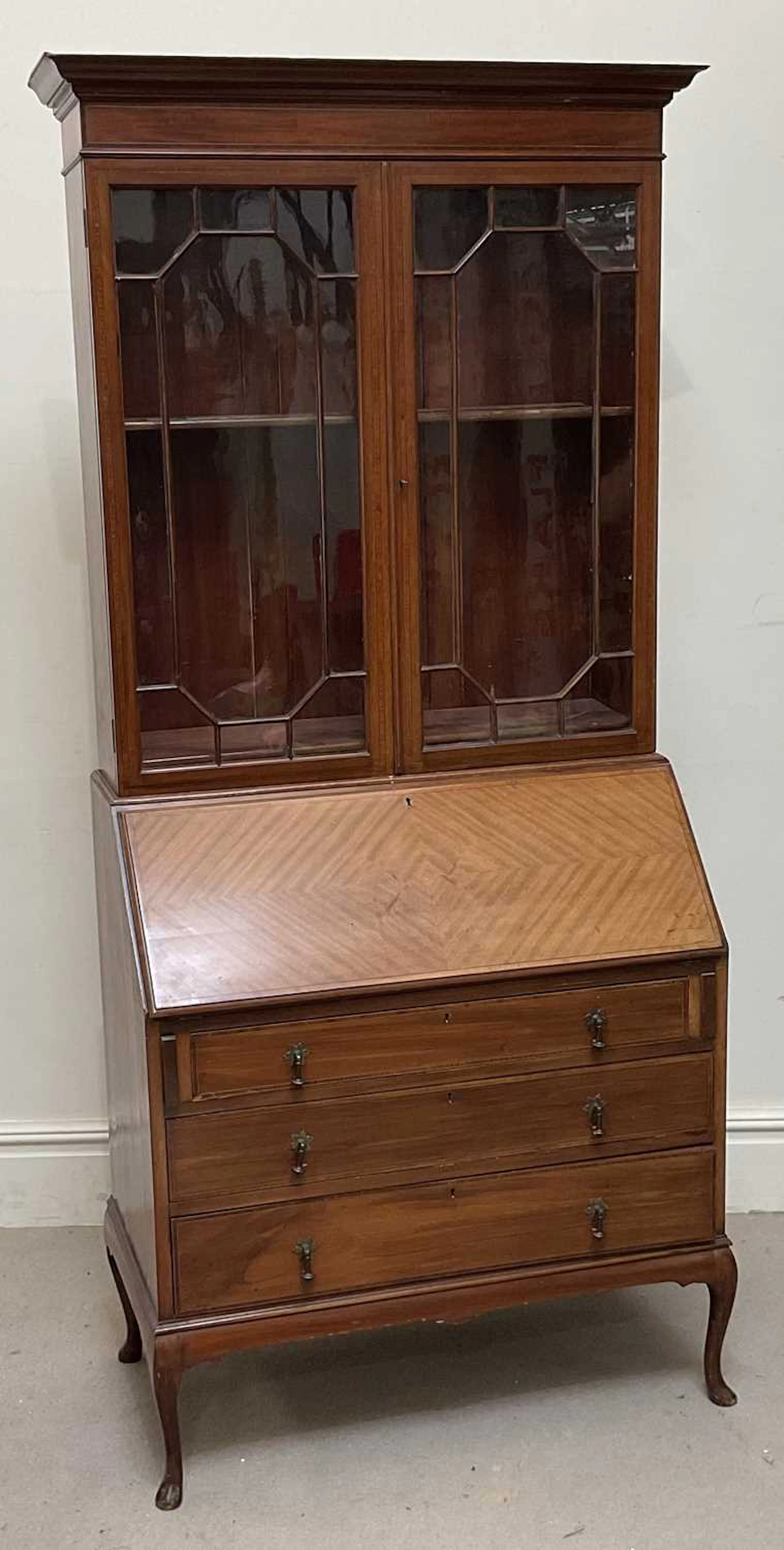 An Edwardian mahogany bureau bookcase