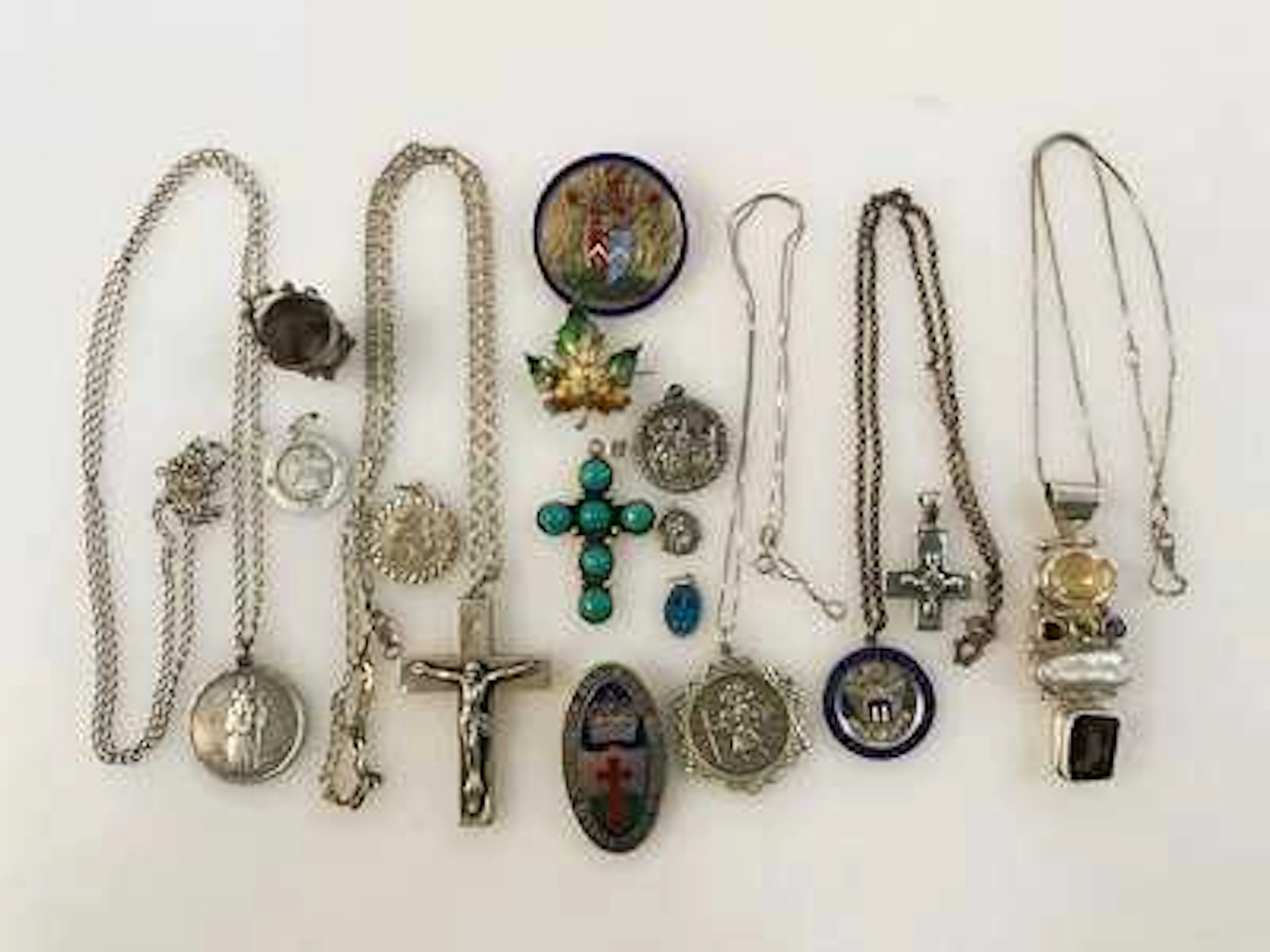 A collection of brooches