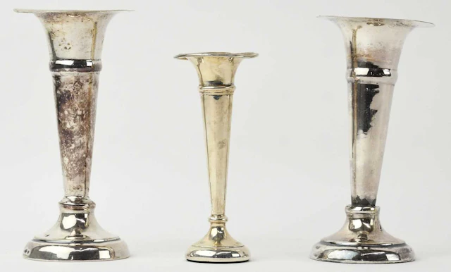 A small Elizabeth II hallmarked silver trumpet vase
