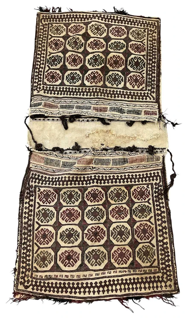 An antique nomadic woollen khorjin double saddle bag