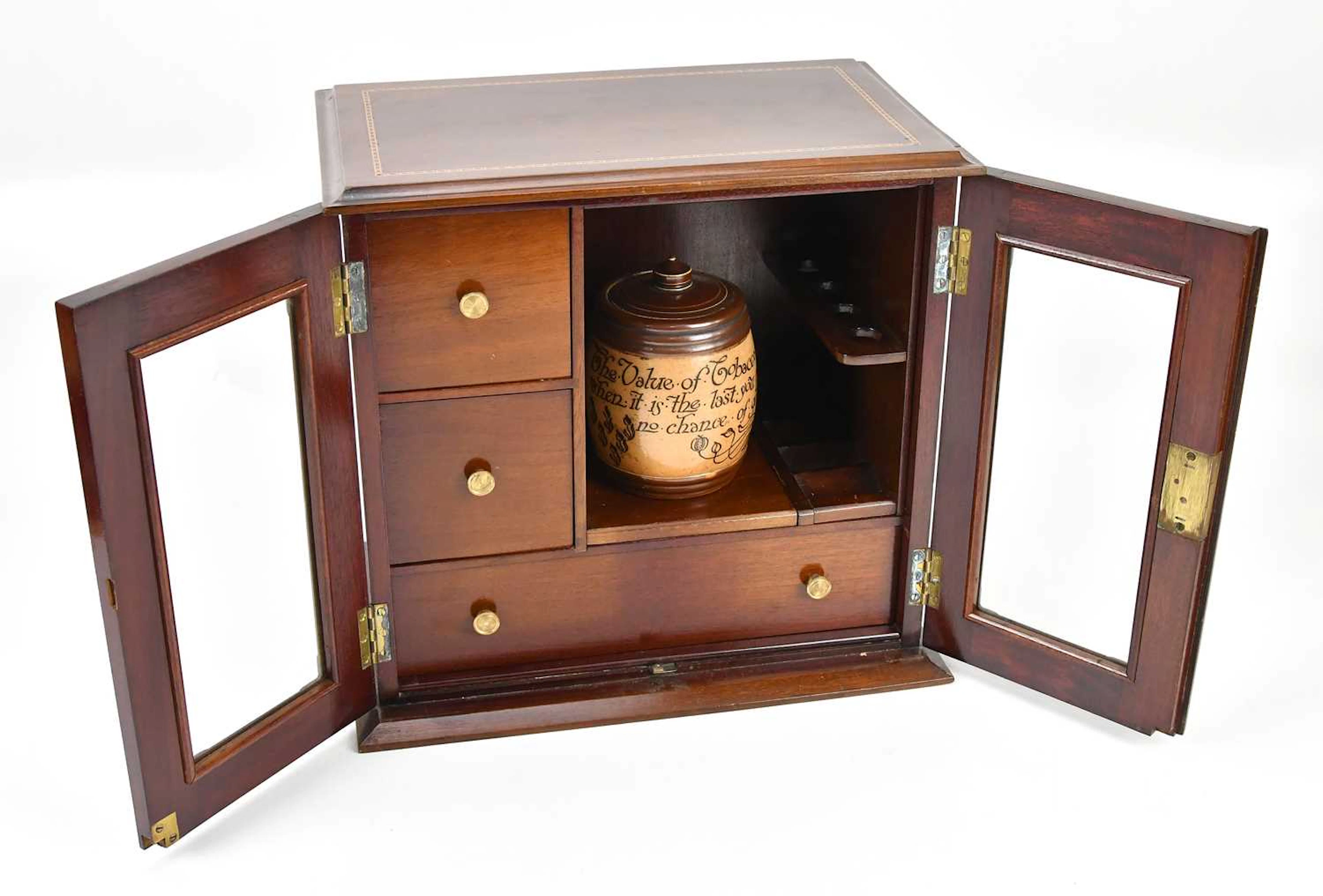 An early 20th century mahogany and string inlaid smoker's cabinet