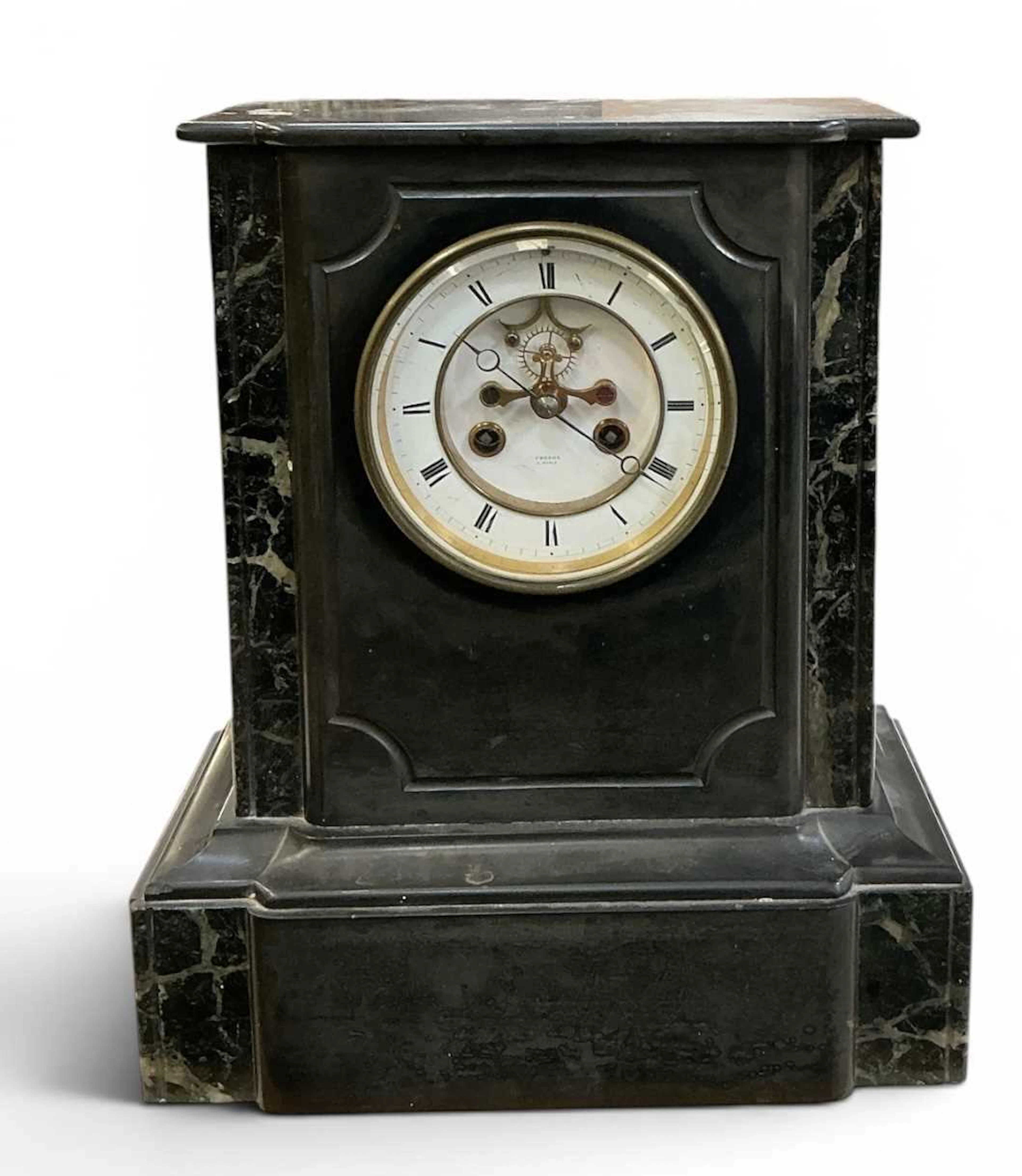 A late 19th century French slate and green marble mantel clock