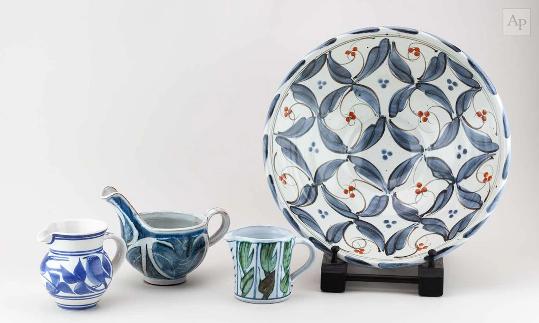 MOHAMED HAMID; a large stoneware bowl covered in white glaze with cobalt