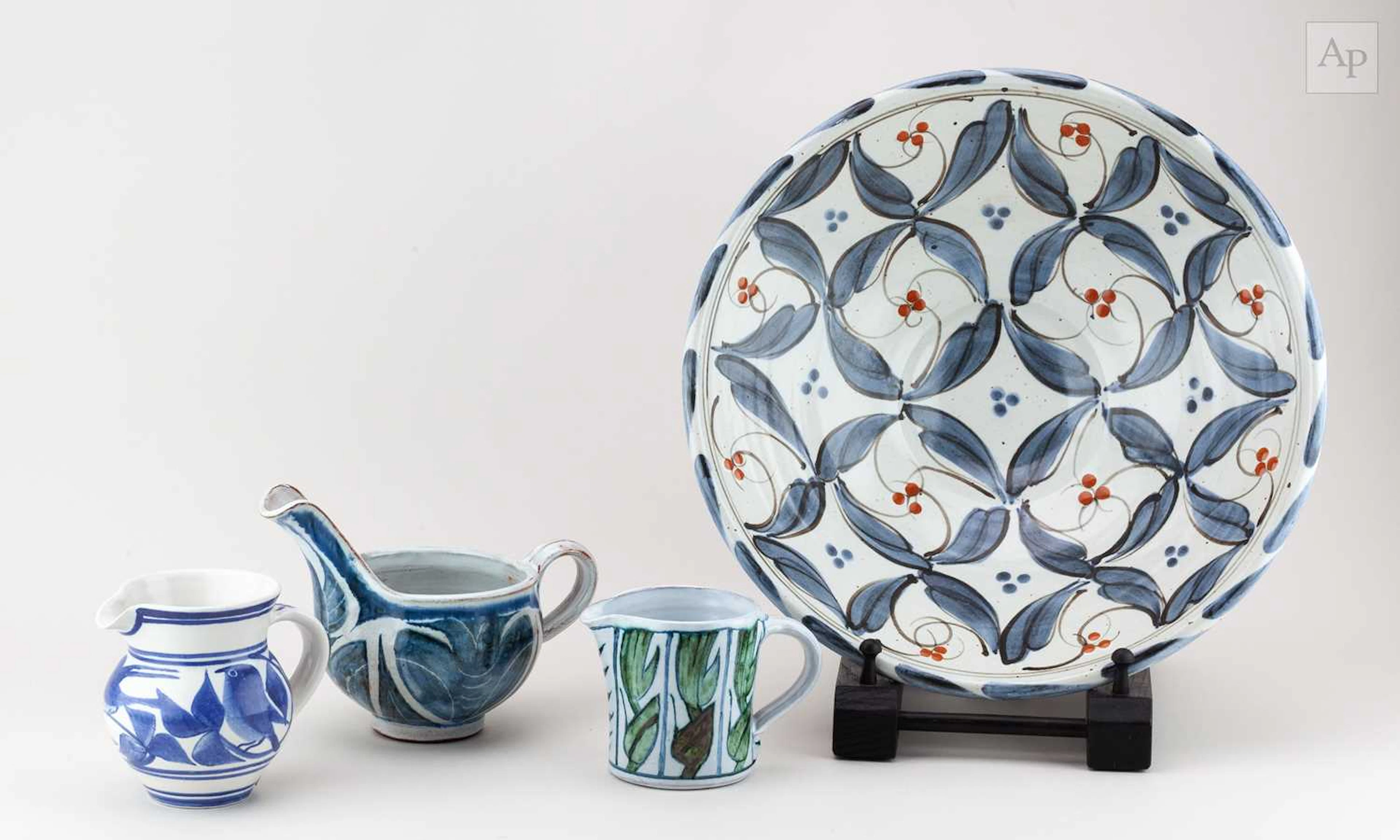 MOHAMED HAMID; a large stoneware bowl covered in white glaze with cobalt