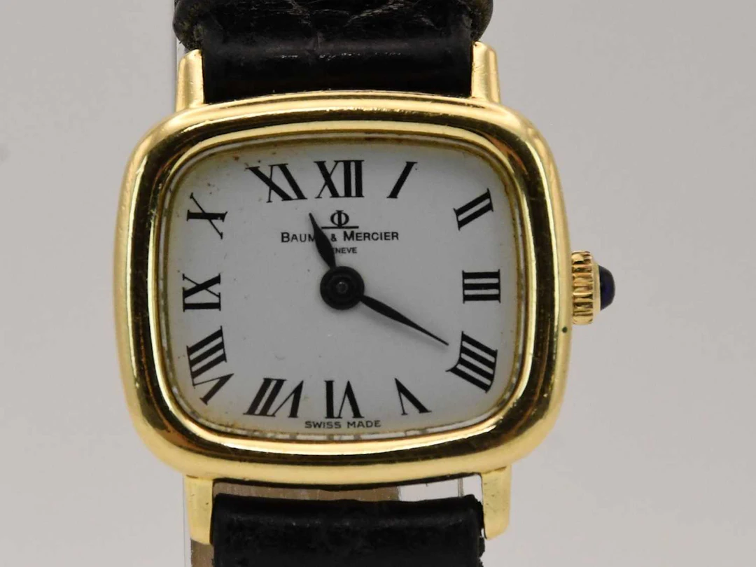 BAUME & MERCIER; an 18ct yellow gold cased lady's wristwatch