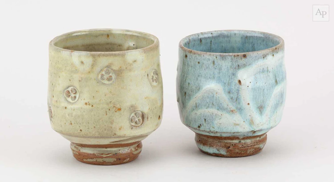 TAKESHI YASUDA (born 1943); a stoneware yunomi covered in...