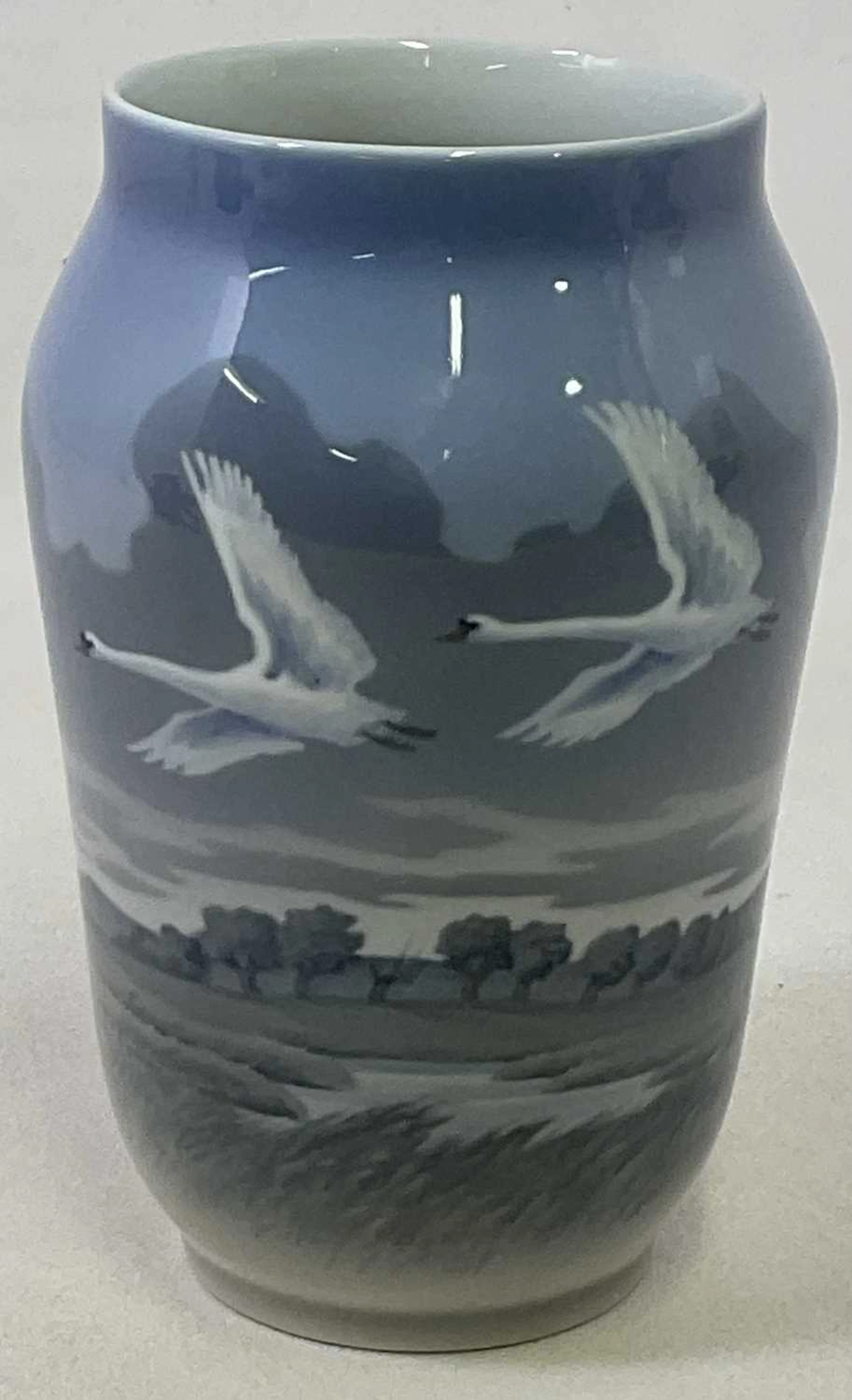 ROYAL COPENHAGEN; a large vase decorated with two swans in flight