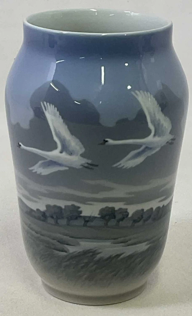 ROYAL COPENHAGEN; a large vase decorated with two swans in flight