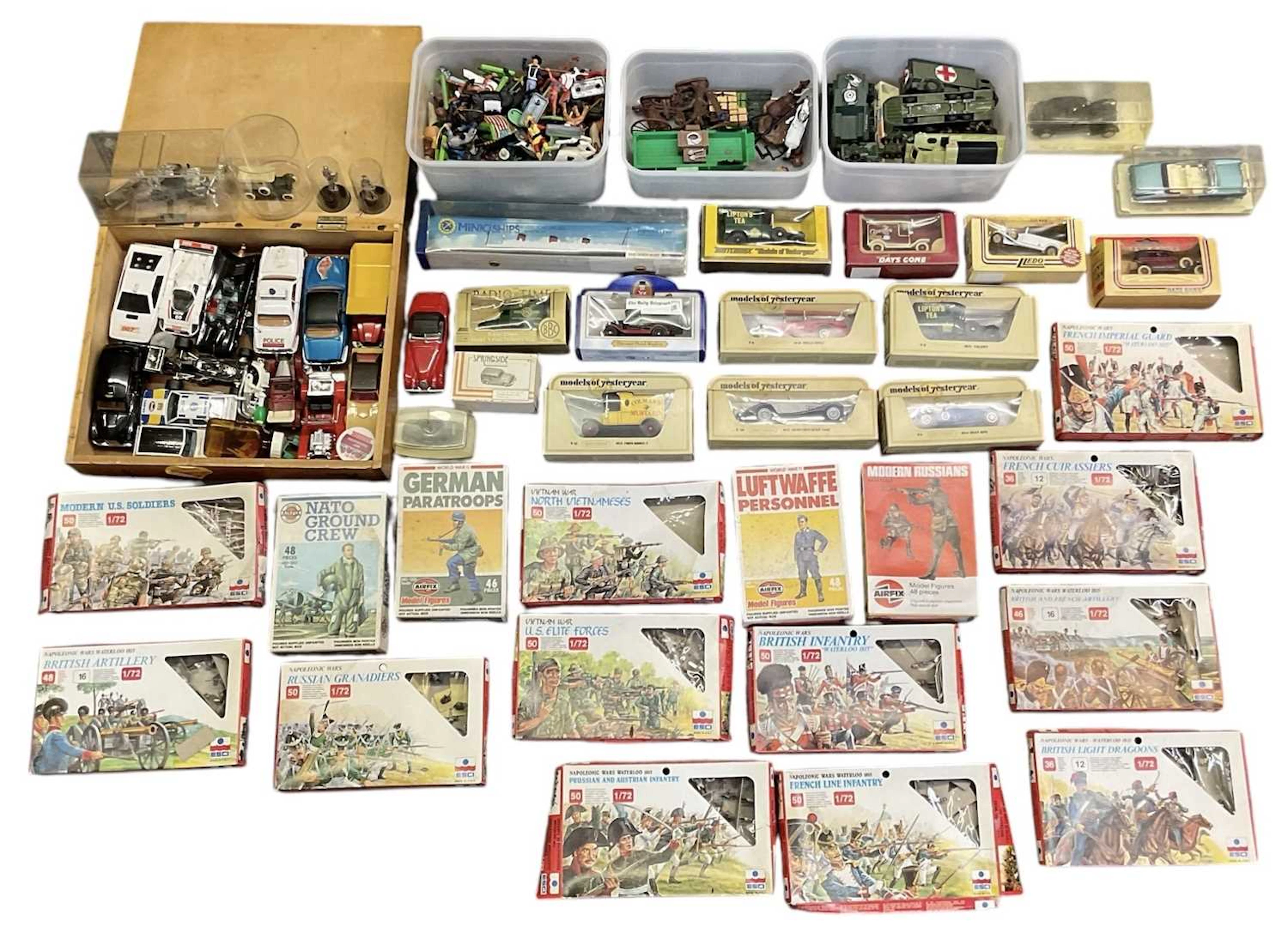 A large quantity of assorted vintage and modern toys