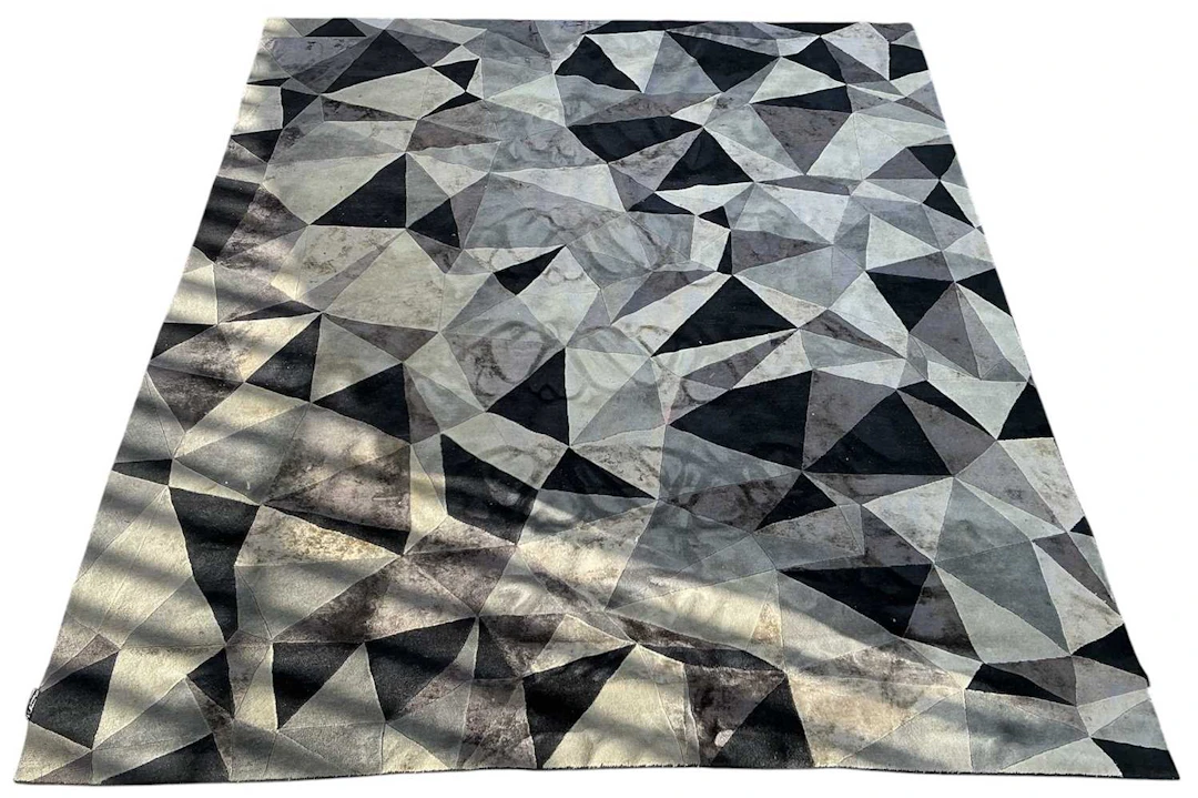 CARPET COUTURE ITALIA; a modern contemporary black and...