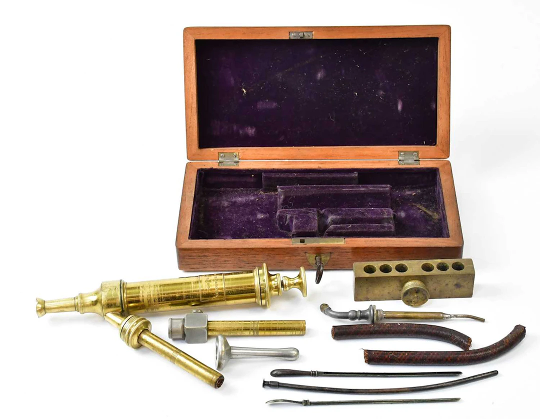 A Victorian cased brass enema by Reay & Robinson