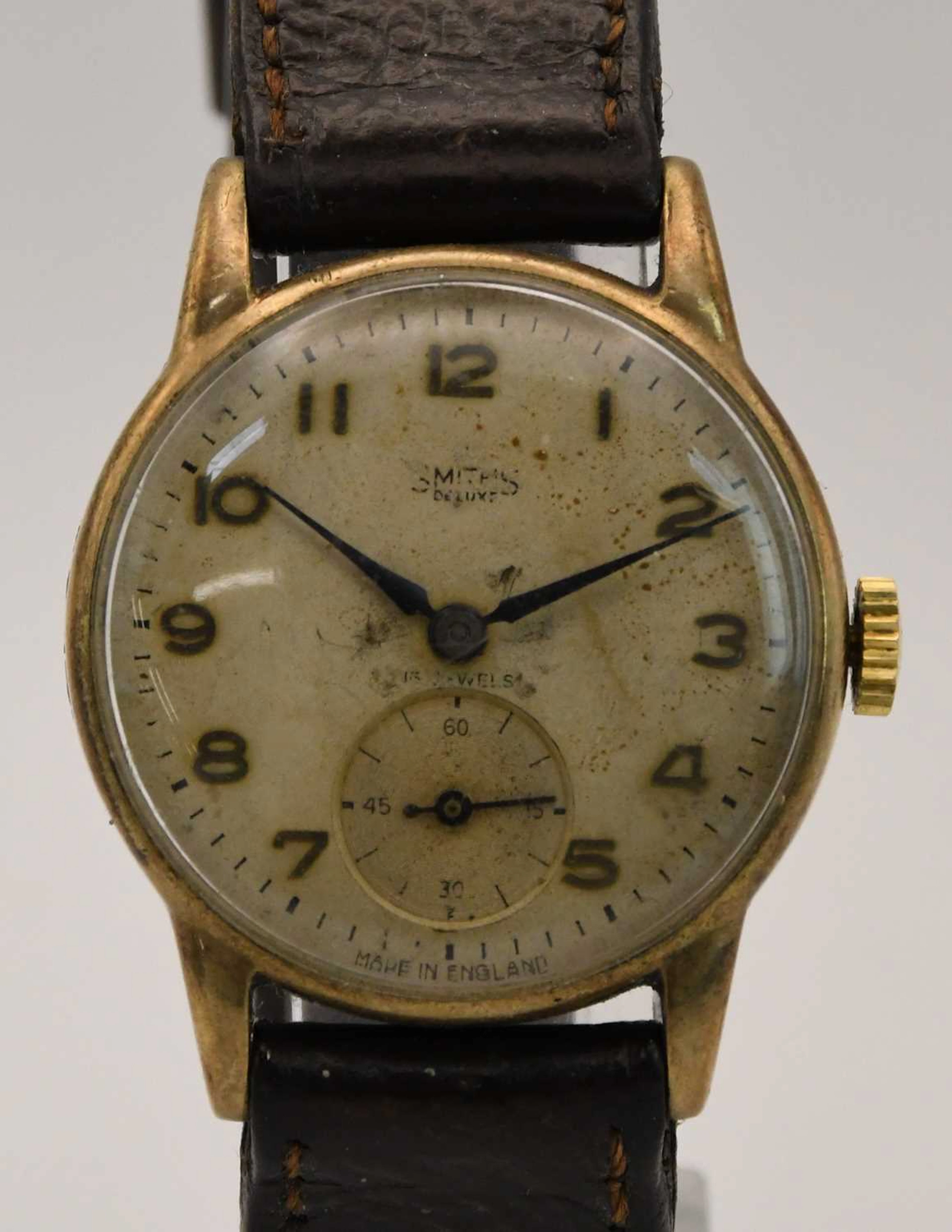SMITHS; a gentleman's 9ct gold wristwatch