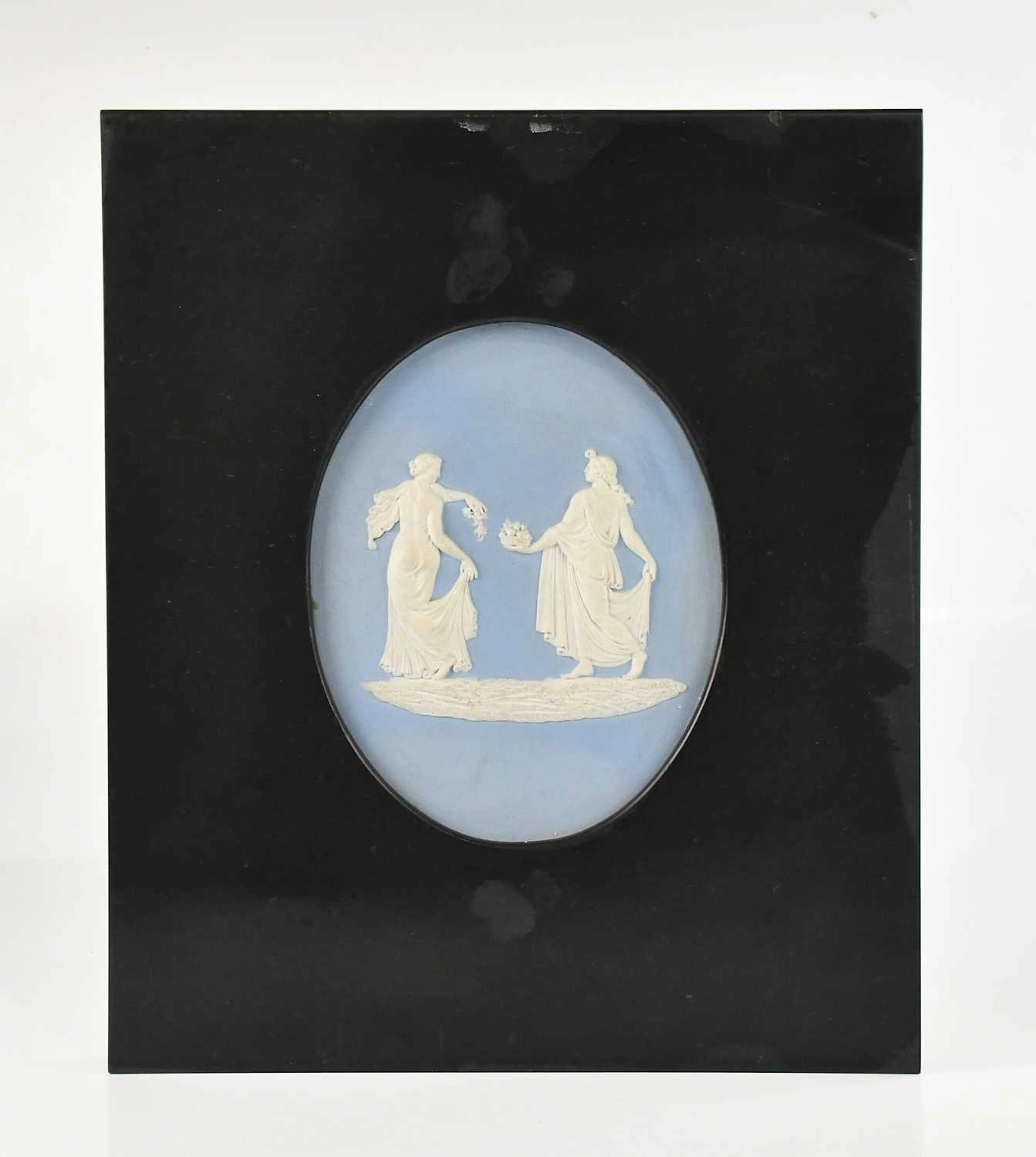 ATTRIBUTED TO WEDGWOOD; a blue jasperware oval plaque representing Two Graces