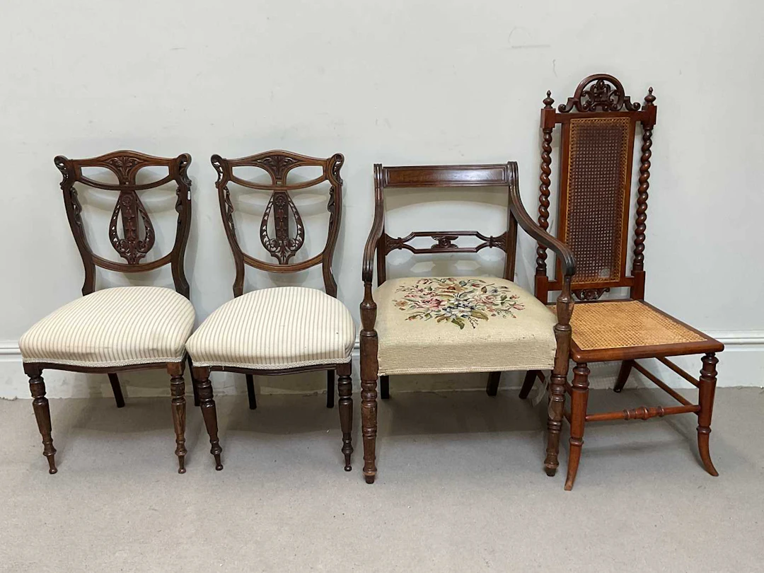 A 19th century open sided elbow chair with tapestry seat