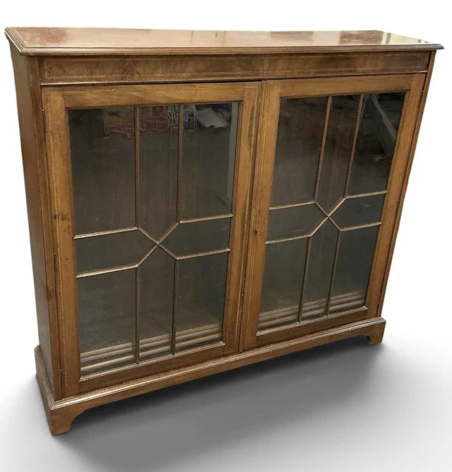 An Edwardian mahogany and satinwood crossbanded display cabinet