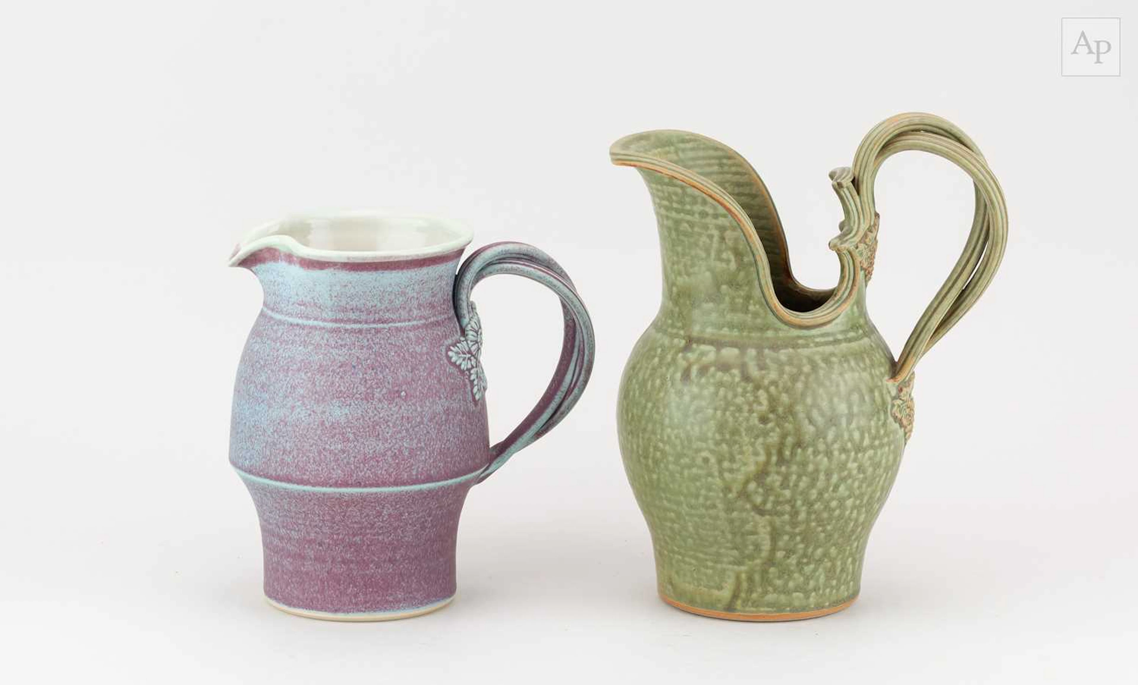 MARTIN HOMER (1945-2023); a stoneware jug covered in...