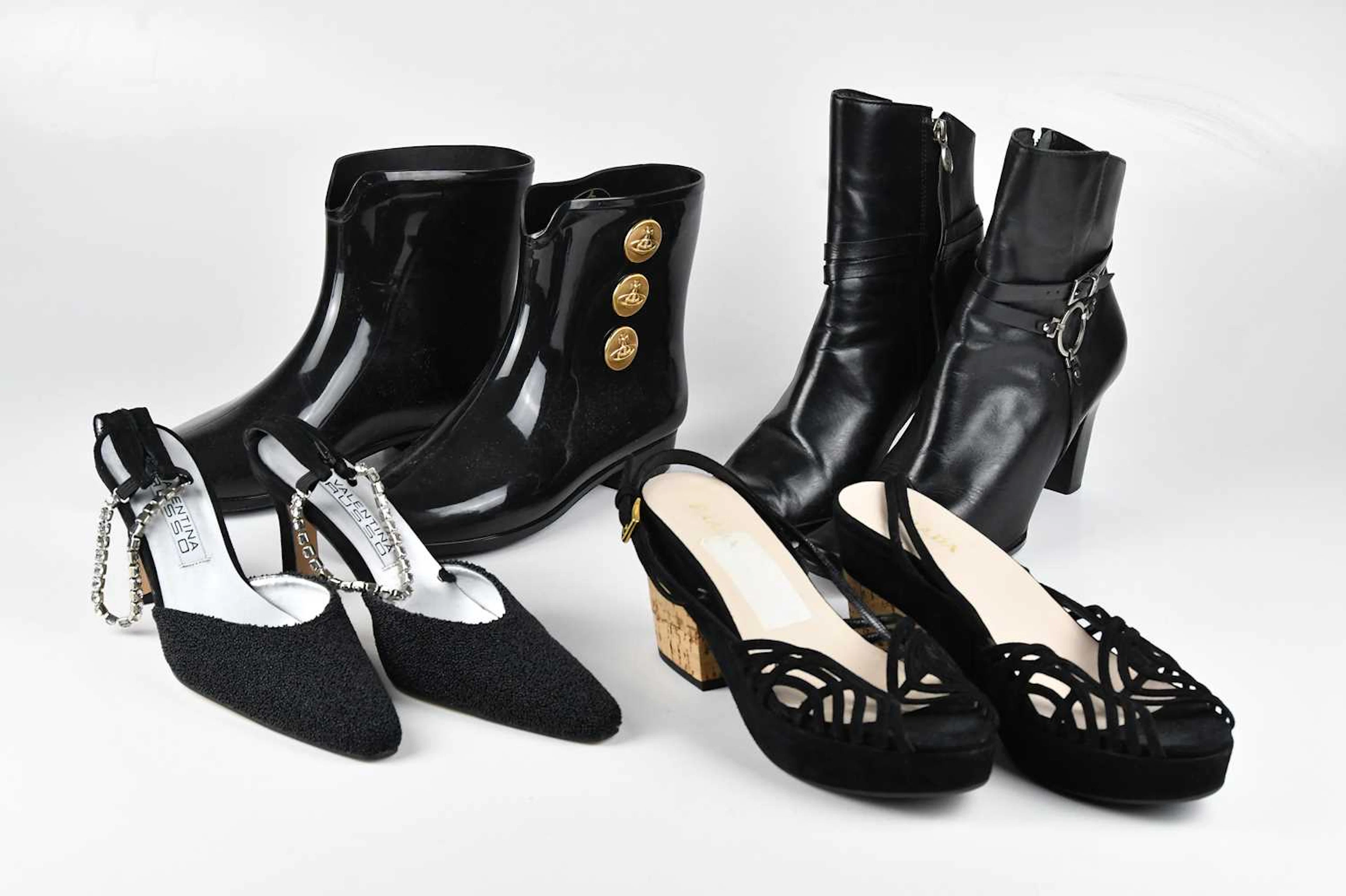 PRADA; a pair of black suede wedge platform sandals