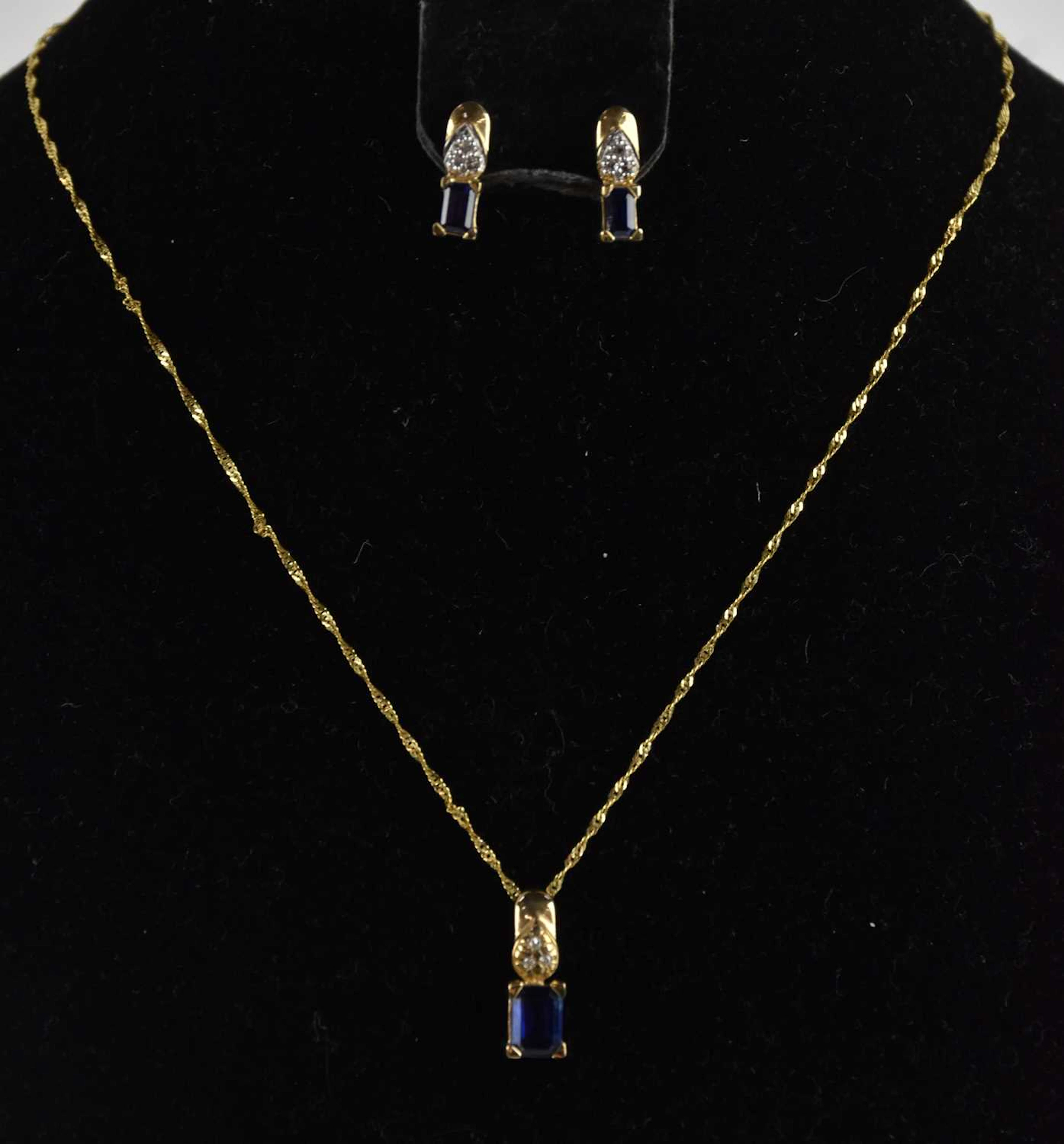 A 9ct Tibetan kyanite and tiny diamond set pendant