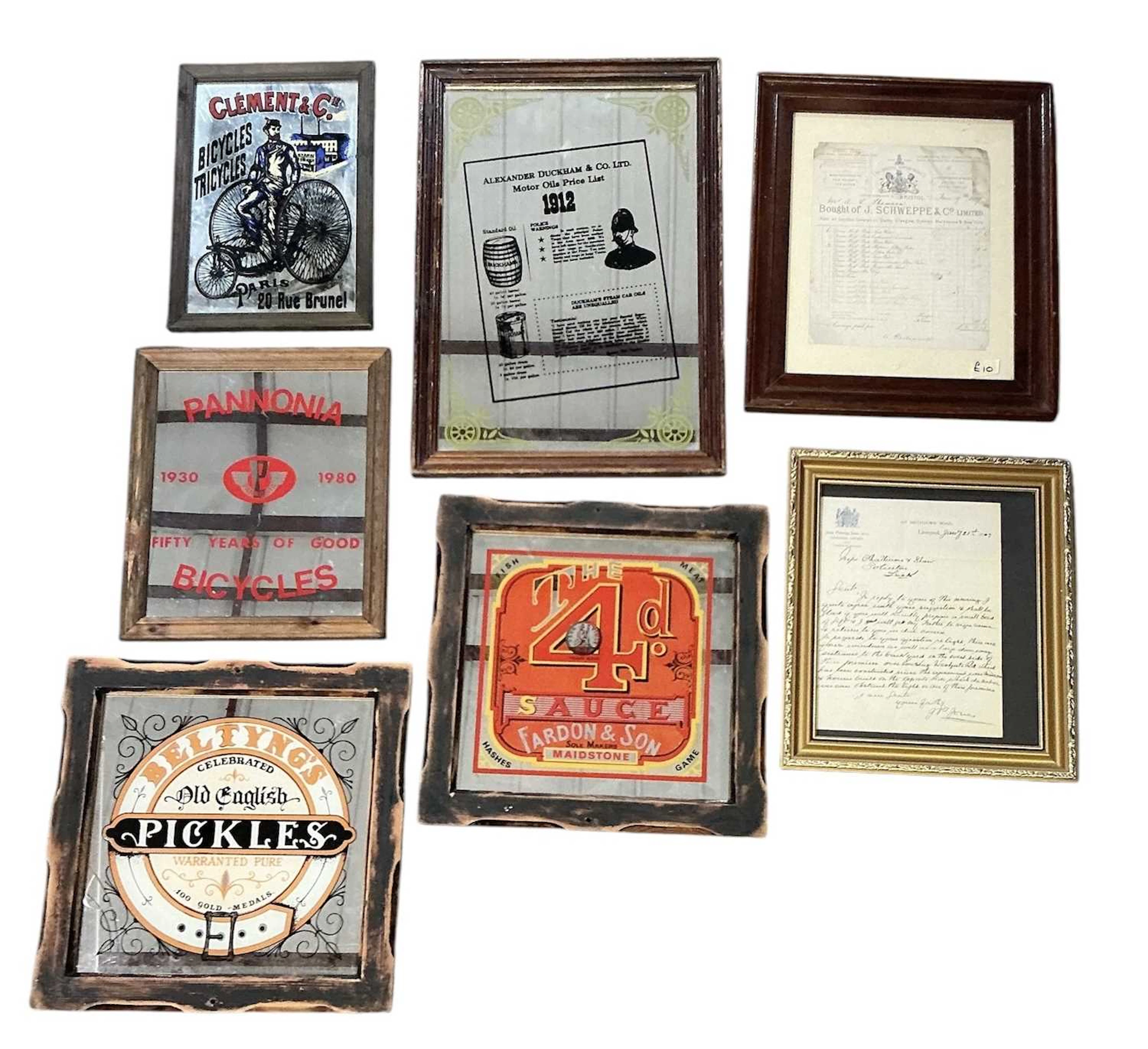 Seven assorted vintage advertising pictures