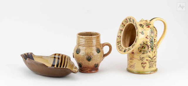 MARY WONDRAUSCH (1923-2016); a slipware salt inscribed 'The Salt of the Earth'