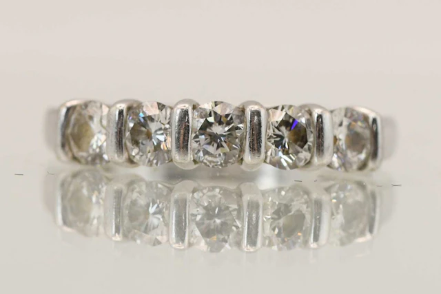 An 18ct white gold diamond five stone ring